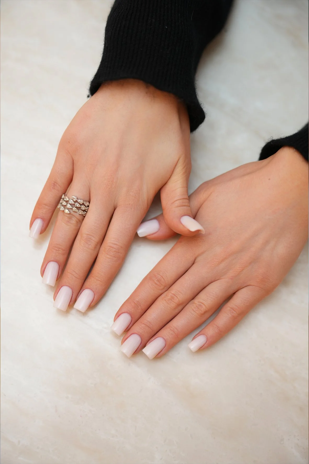 Milky gel polish manicure by Mihaela Croitor.