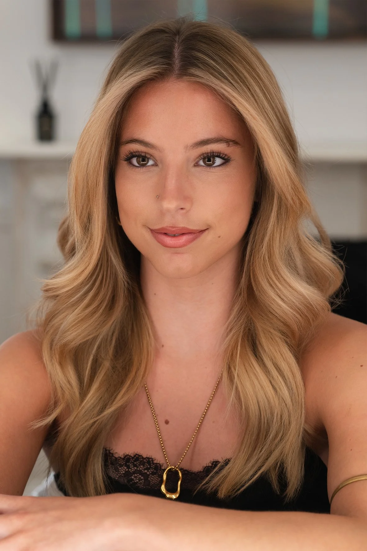 bouncy blow dry on long blonde hair with balayage by Nelson Morales.