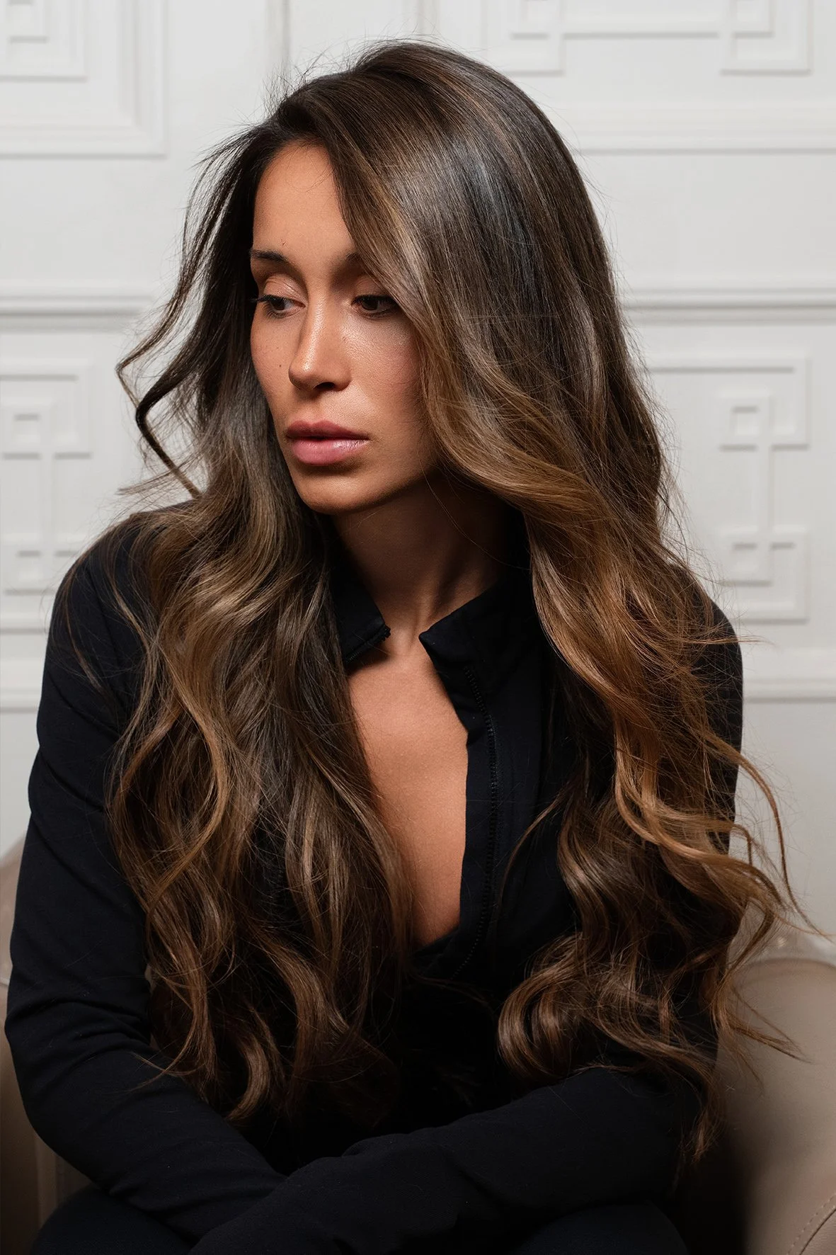 rich chocolate brown with soft warm face framing balayage by Marcos Verissimo.