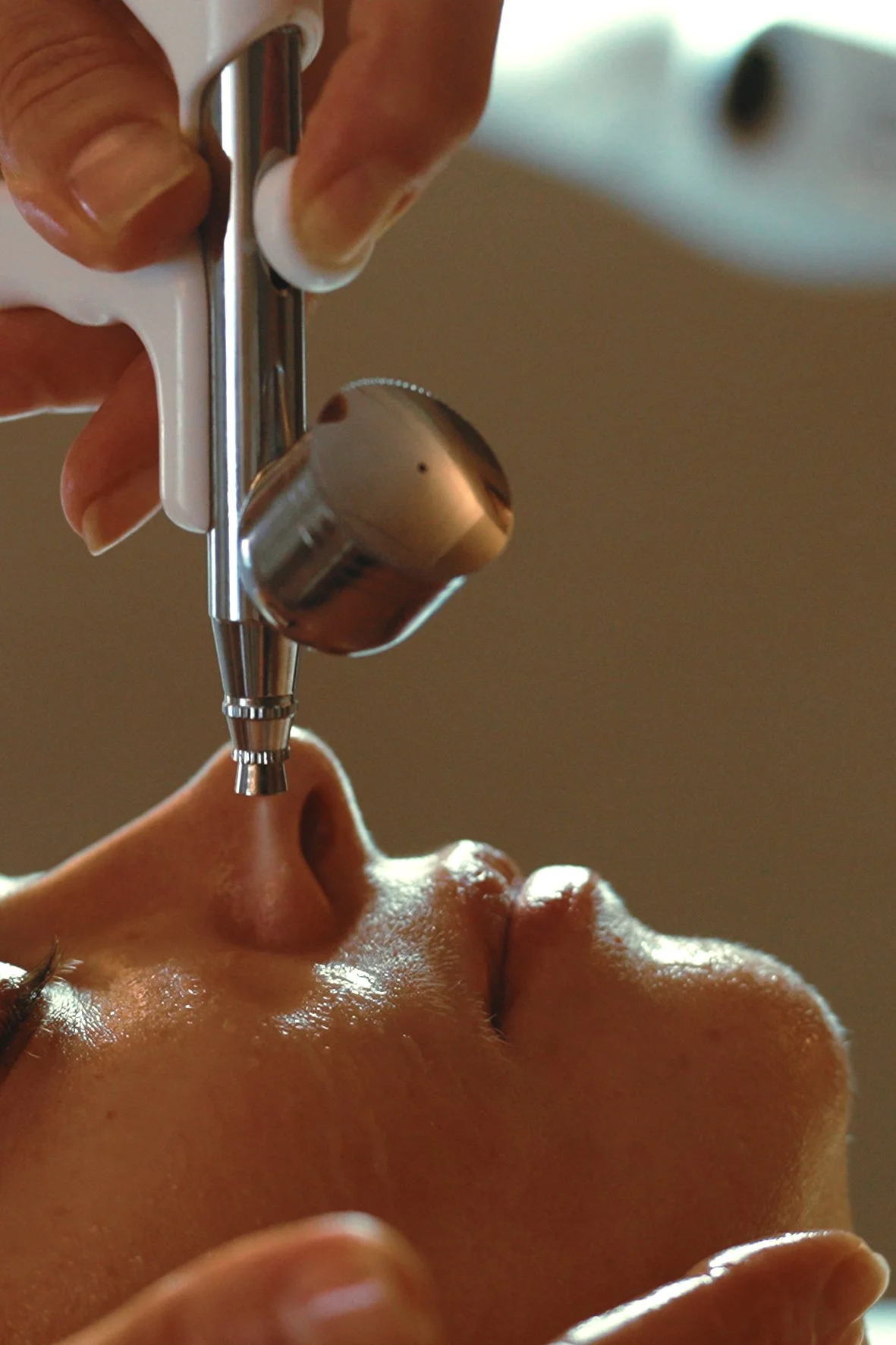 A person receiving a facial skincare treatment by Lana Buckley, at the Six, Mayfair.
