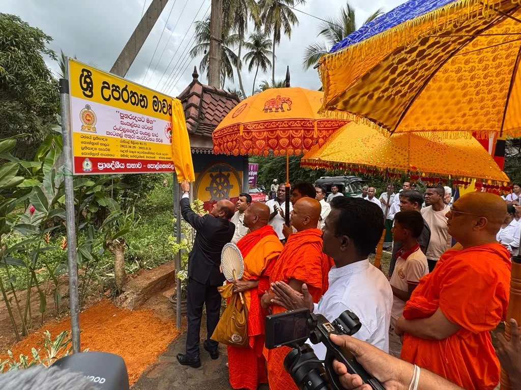 Members of the Maha Sangha, public officials and community members gather for the ceremonial unveiling of Venerable Katugastota Sri Uparatana Nahimi Mawatha in Polgahawela, Sri Lanka. 