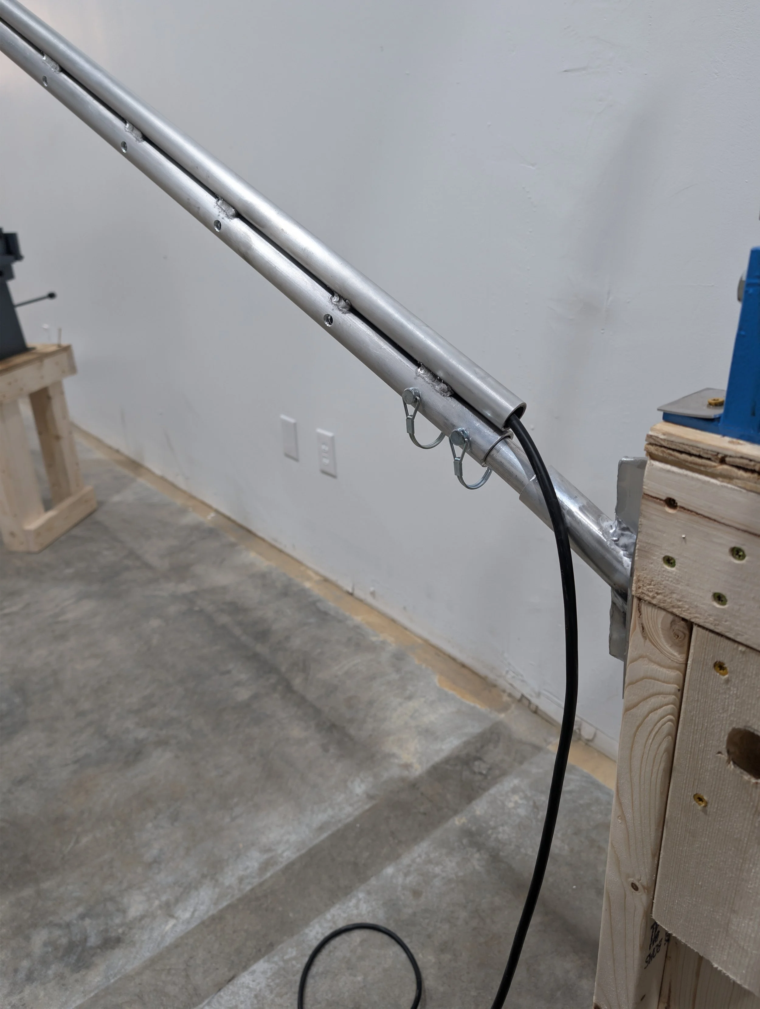 Light pole cord exit.jpg