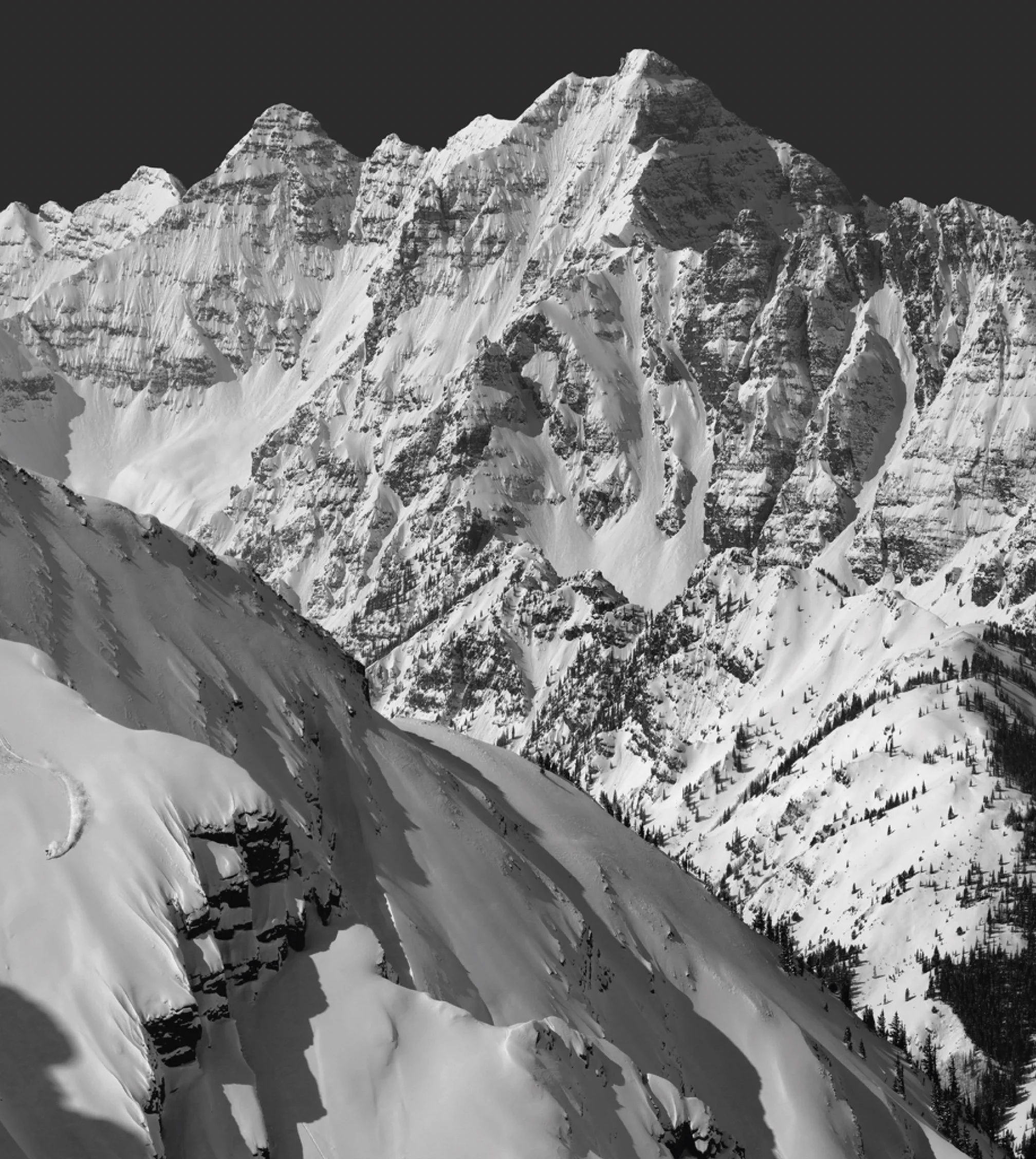 Tonar ski descent with Pyramid Peak in the background, Colorado Elk Mountain Range, ski mountaineering, ski descent, Elk Mountains Traverse