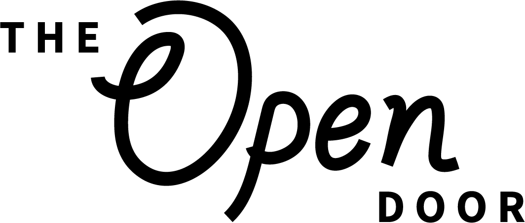 The Open Door logo, featuring Open written in a freehand script