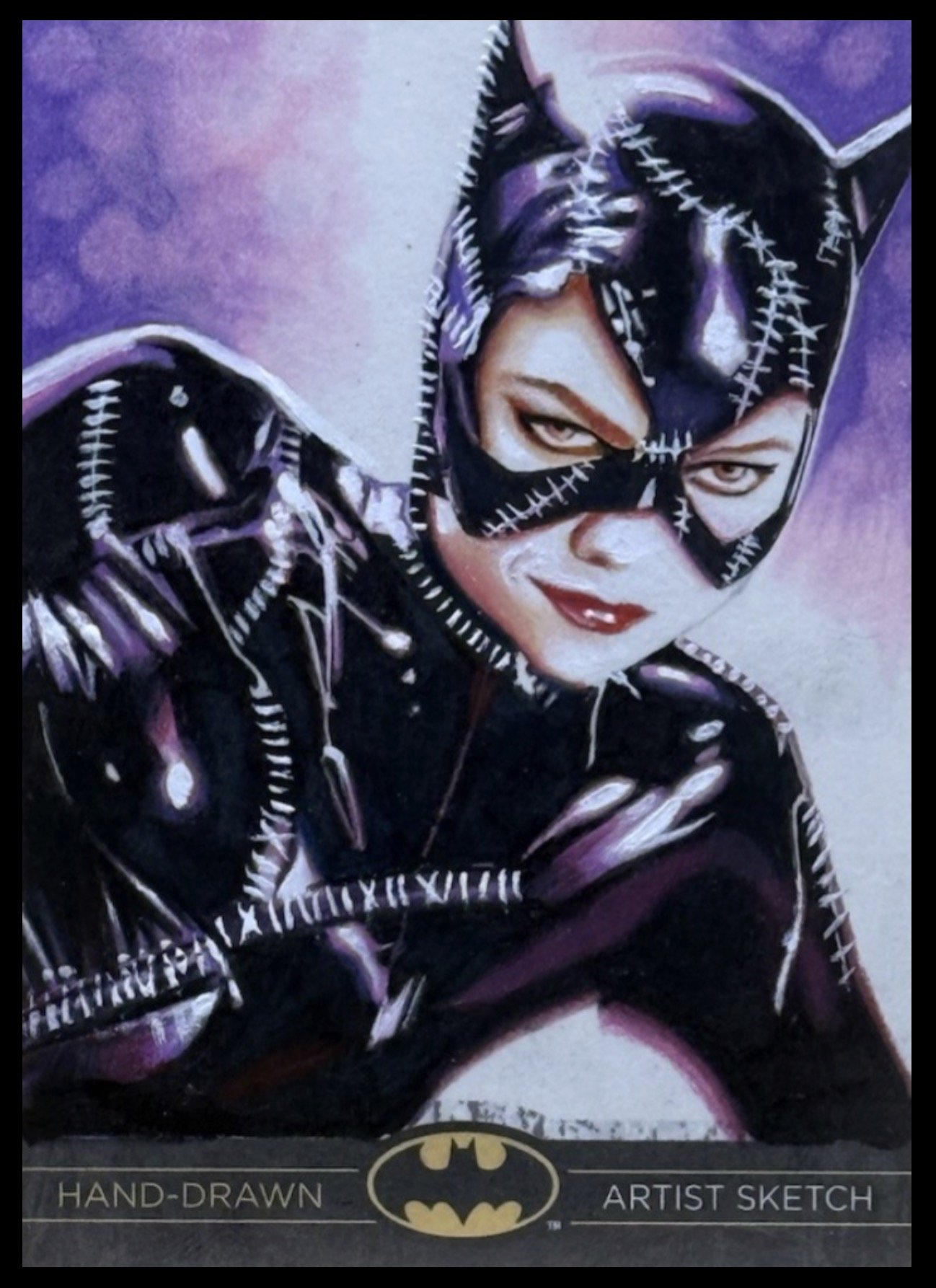 Batman legend sketch card, Catwoman  illustration of Catwoman wearing a mask with cat ears, with a purple background.