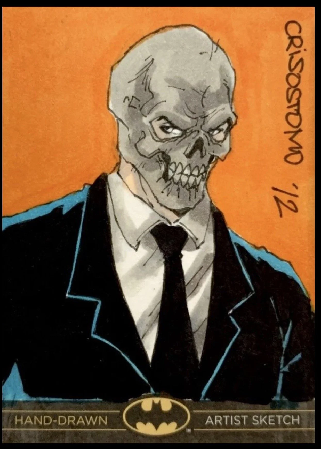 Batman legend sketch card. Drawing of a man with a skeleton face wearing a suit and tie, with a Batman logo and the text "Hand-Drawn" and "Artist Sketch" at the bottom, and "Criticism" written vertically on the right side.