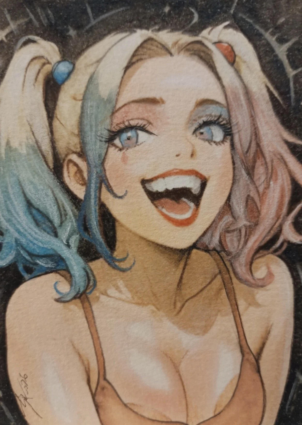 Harley Quinn sketch card. A colorful illustration of Harley Quinn with she is smiling and showing her teeth, with blonde hair in pigtails and blue and pink streaks, wearing a strappy top.