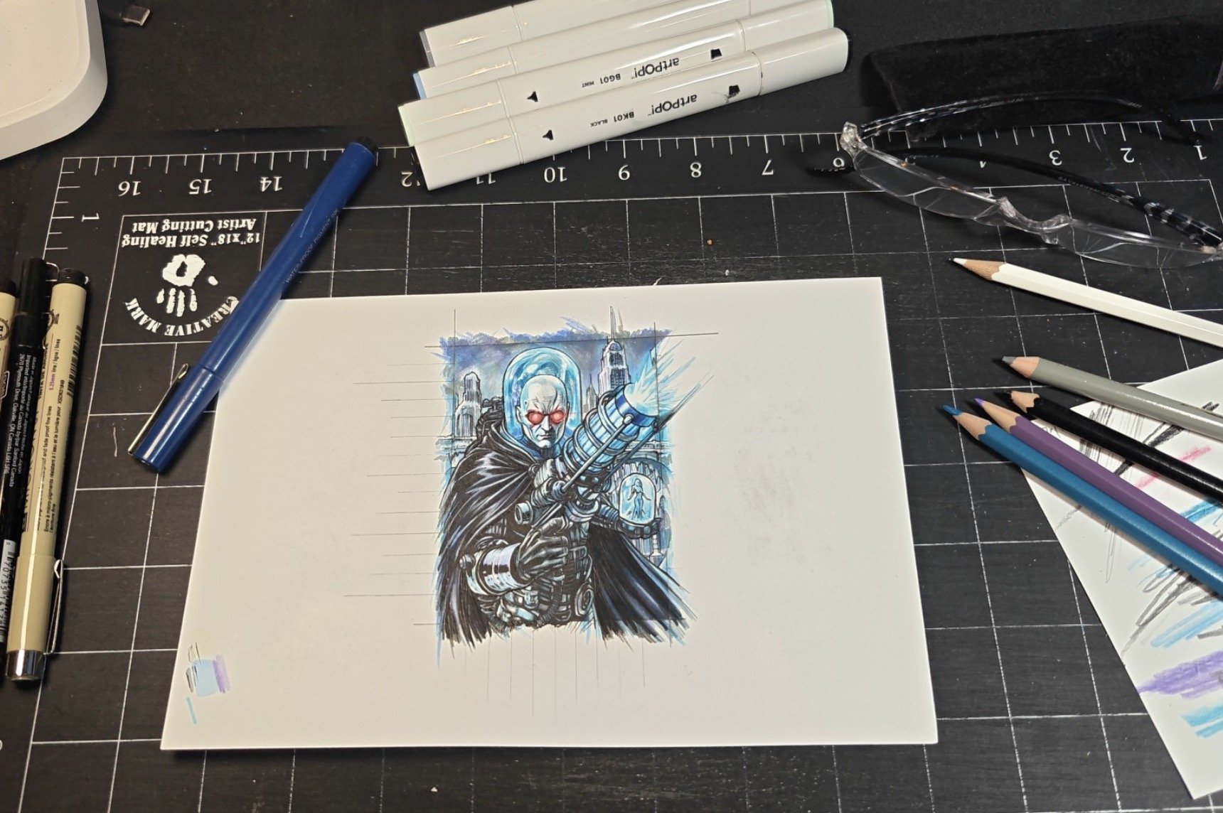 Batman, Mr Freeze sketch by Javier. A drawing of a villainous character with a clown-like face, wearing a dark cloak, holding a weapon, and standing in front of a cityscape with tall buildings and a glowing blue background.