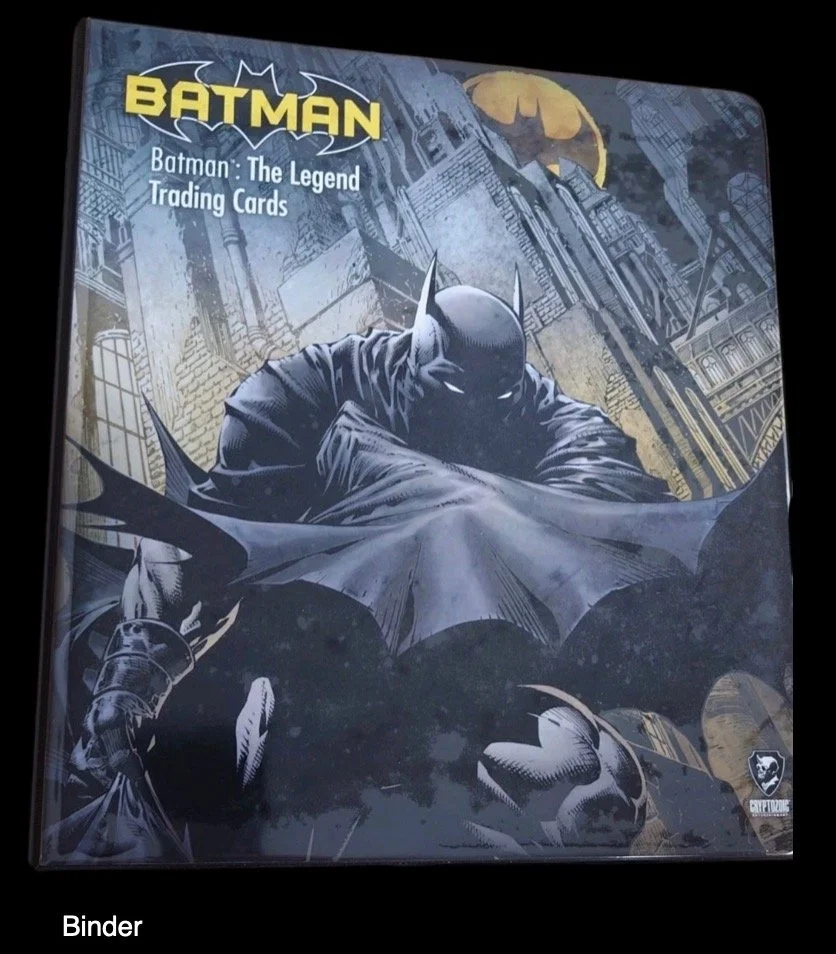 Cover of a Batman trading cards binder featuring Batman in a dark cityscape with the Bat-Signal in the background.