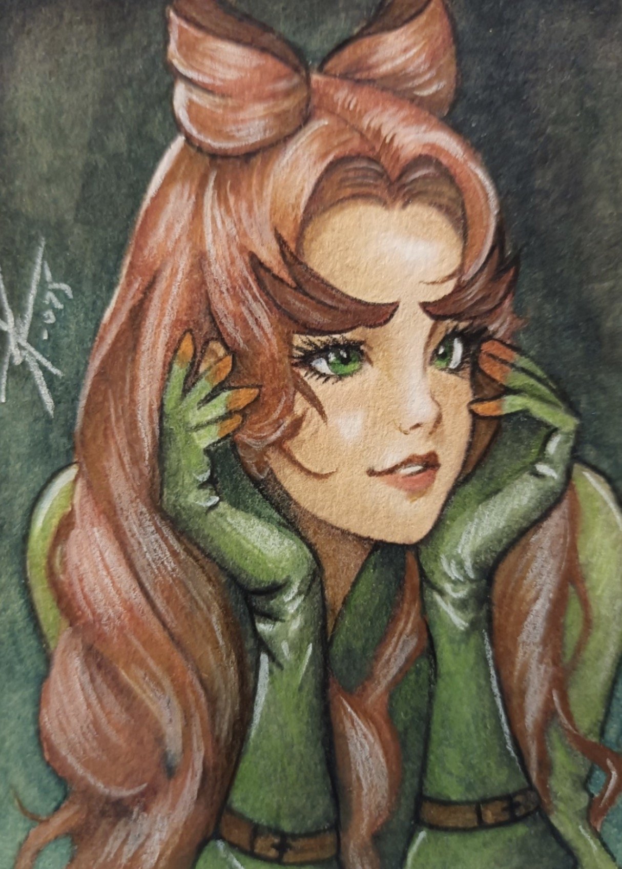 Poison Ivy sketch card. Drawing of a woman with long red hair, green eyes, and green gloves, wearing a matching green top.