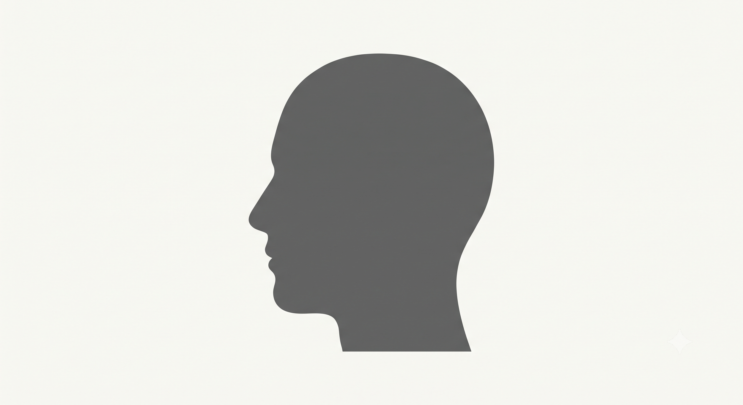 Silhouette profile of a person's head in dark gray against a light background.