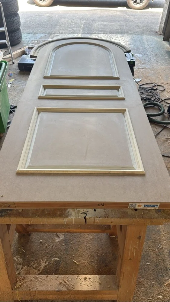 Certified Flamebreak fire door core with bespoke moldings under construction in the workshop