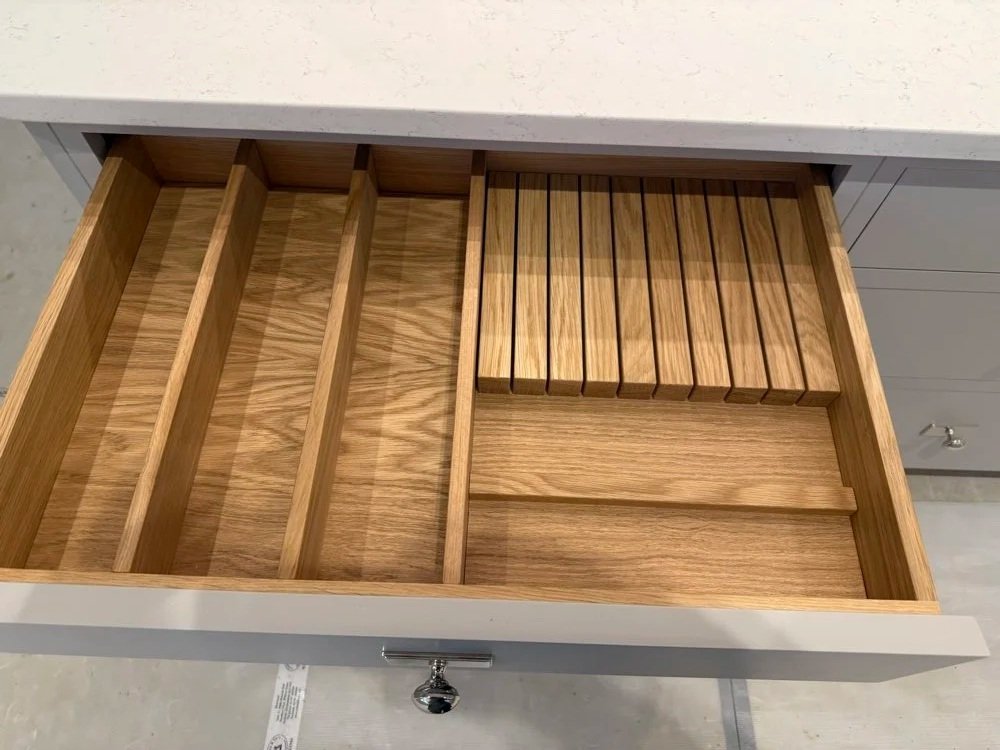Bespoke solid natural oak door-mounted spice rack and integrated knife block inside a painted pantry cabinet by Ken Pope Custom Joinery in Welwyn Hertfordshire