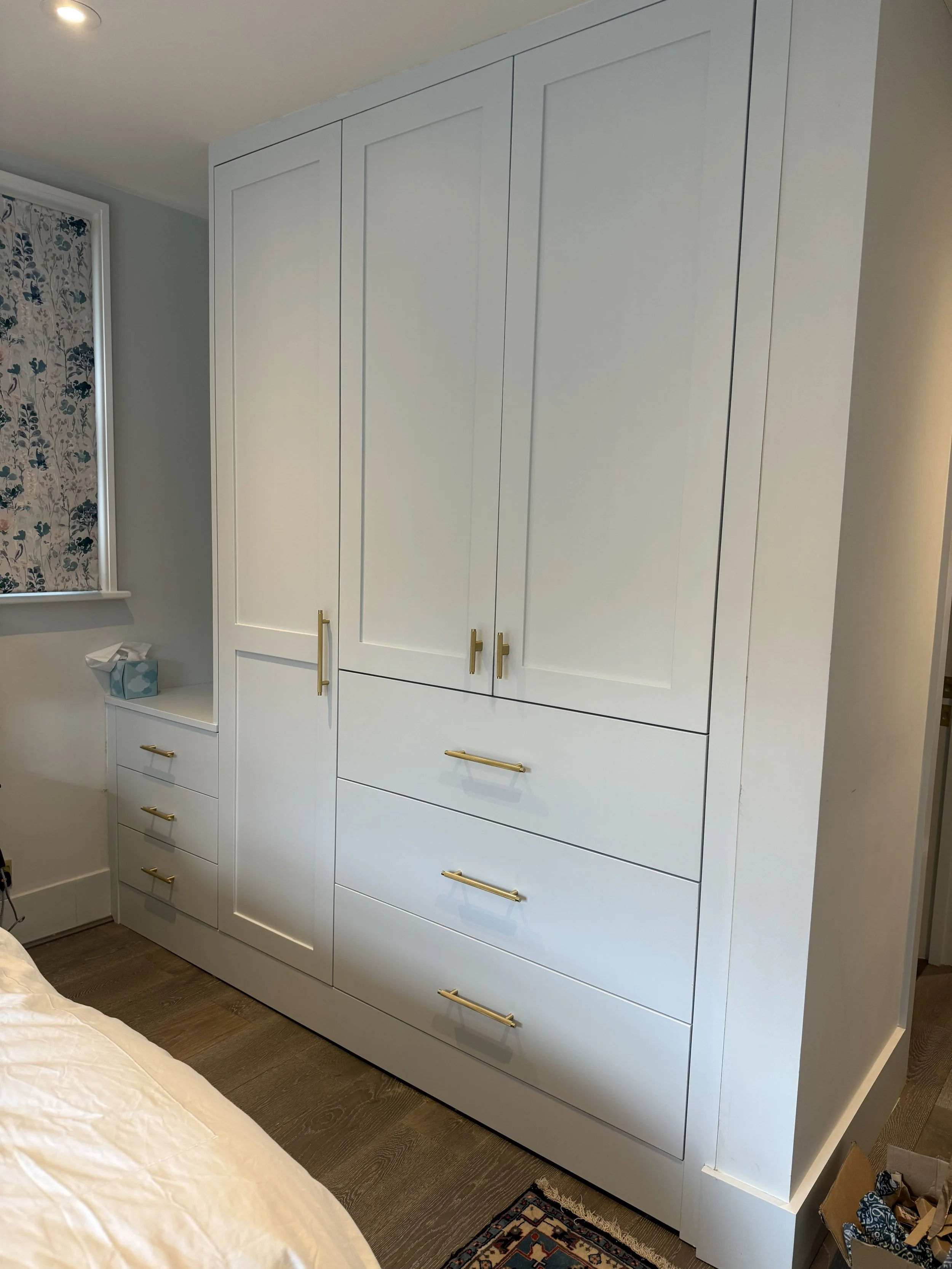 Premium built-in white Shaker wardrobes with walnut veneer carcass