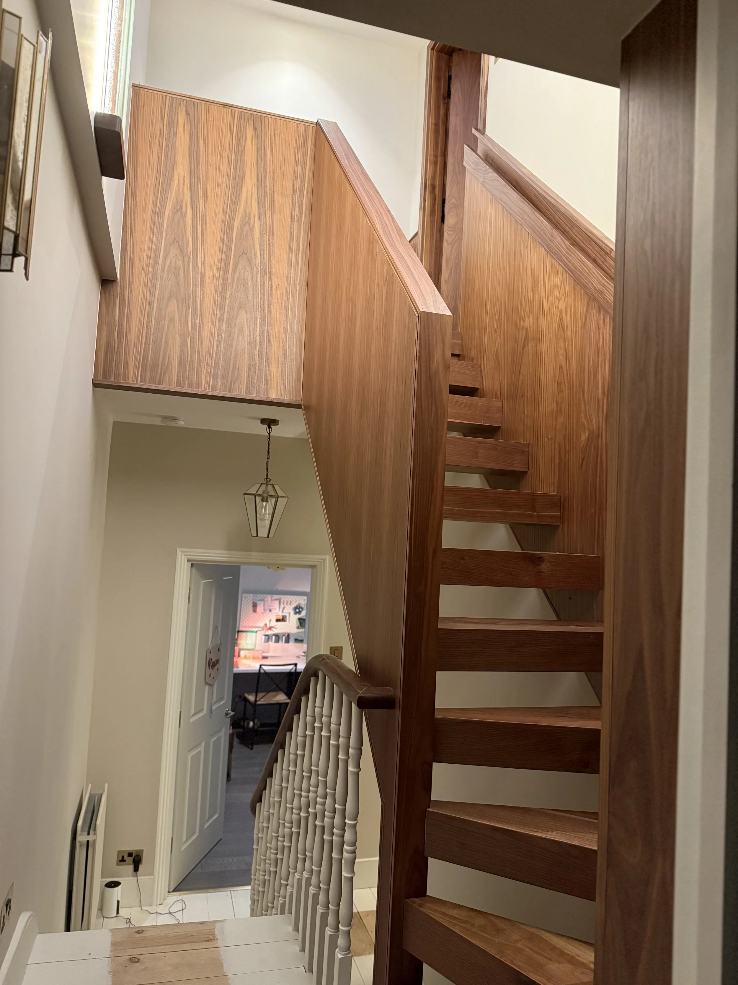 Bespoke open-tread walnut staircase manufacturer London Ken Pope Custom Joinery