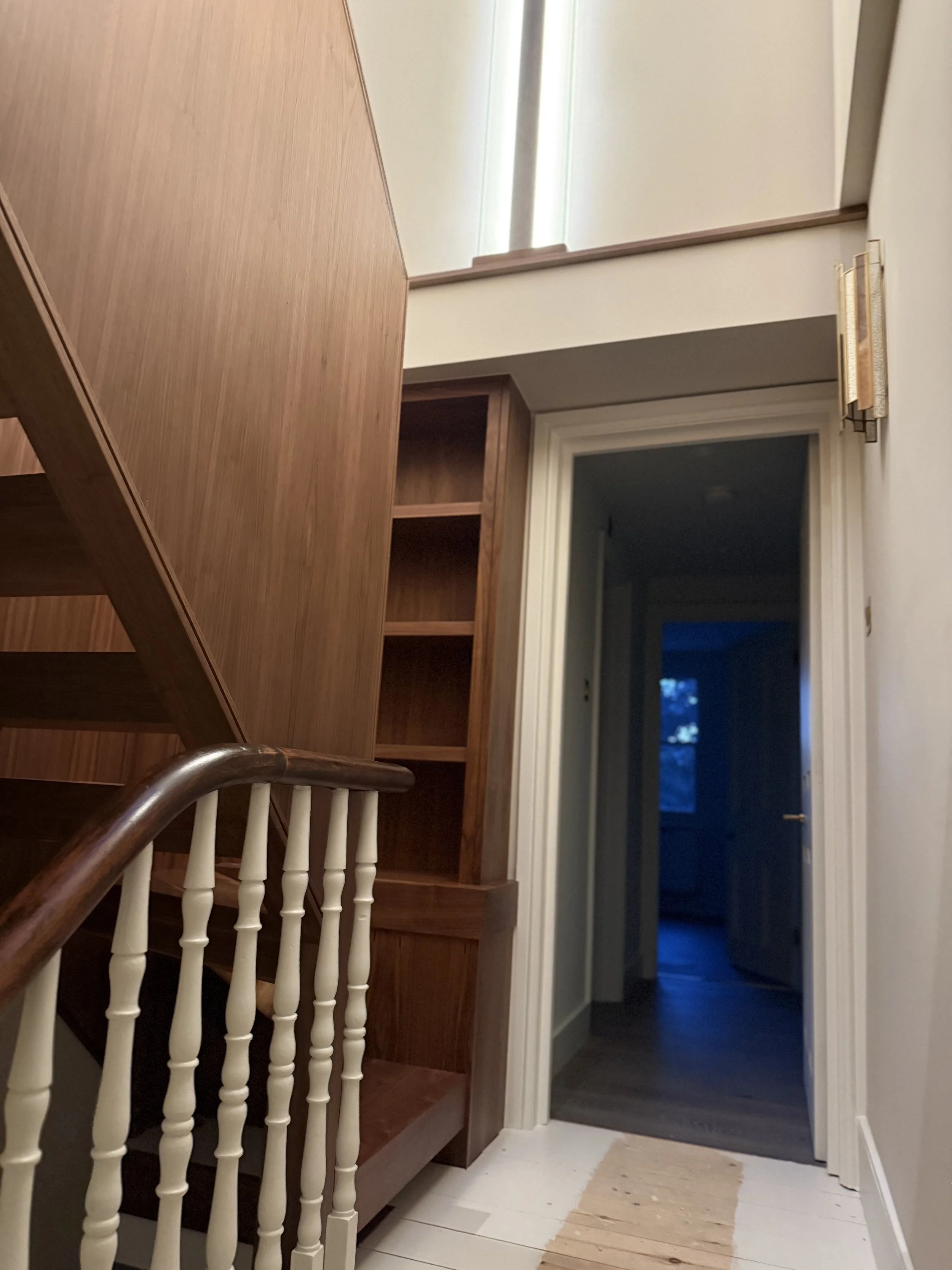 Bespoke open-tread walnut staircase manufacturer London Ken Pope Custom Joinery