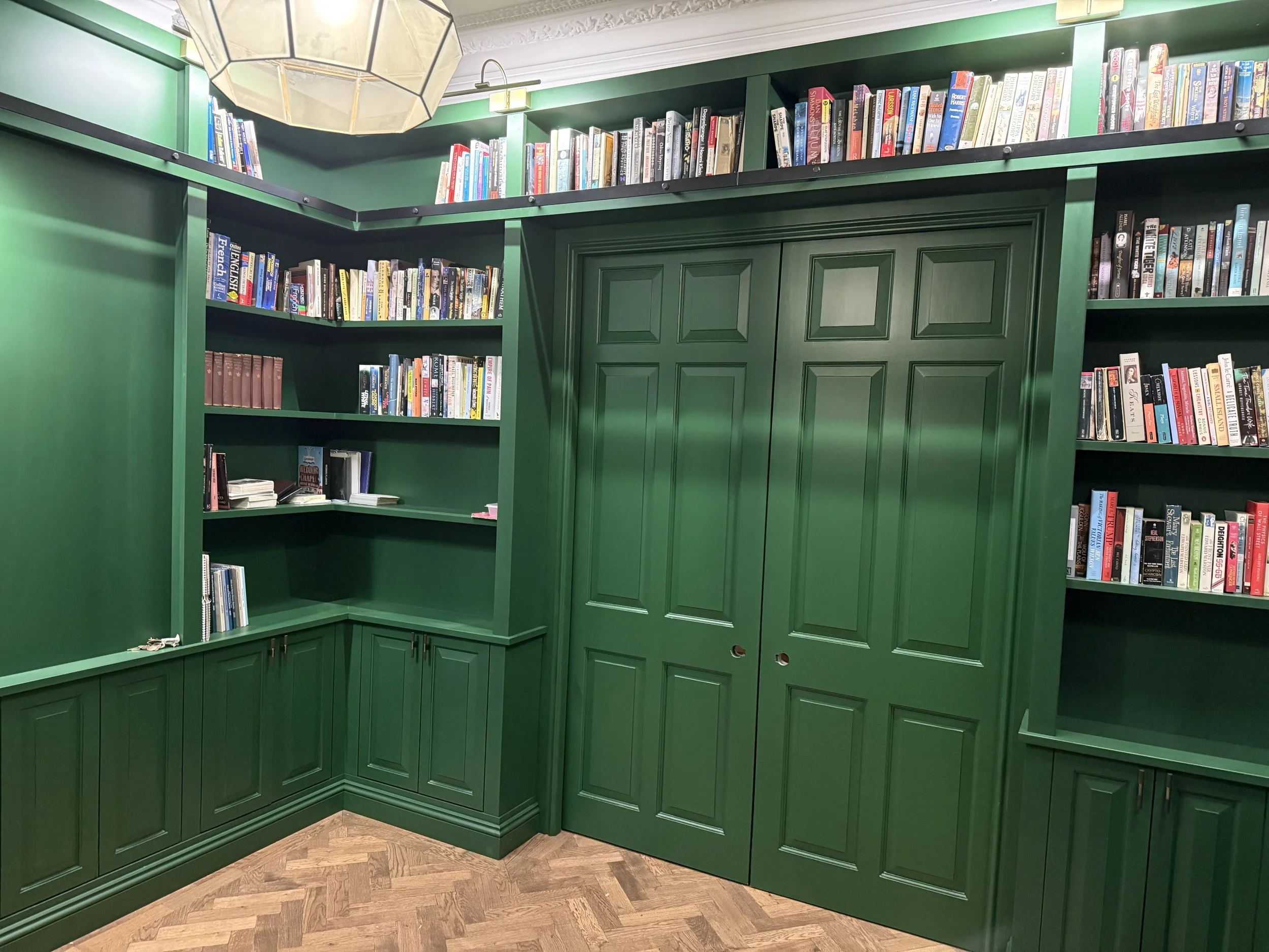 Bespoke traditional wrap-around library forest green lacquer Stotfold workshop