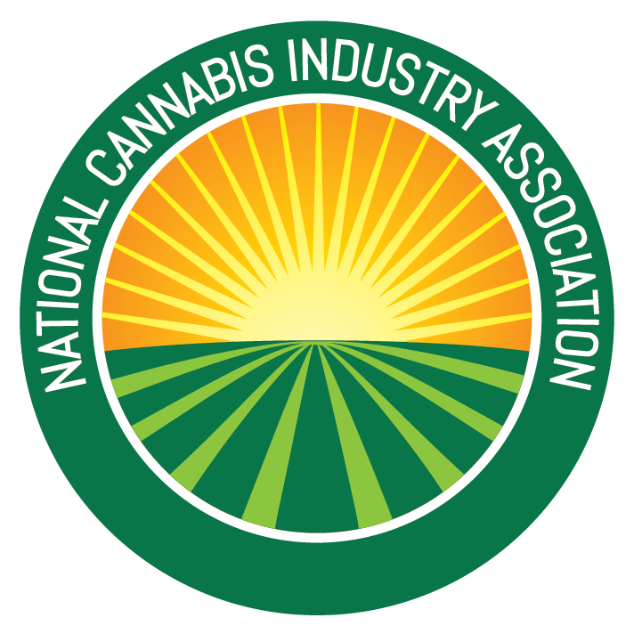Logo of the National Cannabis Industry Association featuring a stylized sun rising over a field of green plants or crops with the organization's name encircling it.