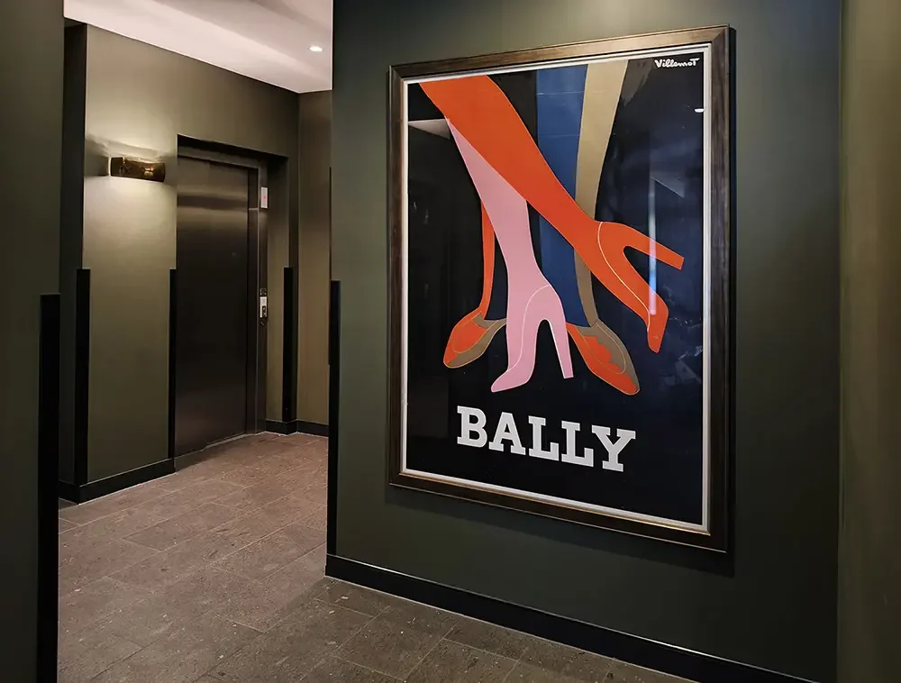 Dynamic interior common area wall colour, selected to make the artwork shine, in this South Brisbane rental tower. 