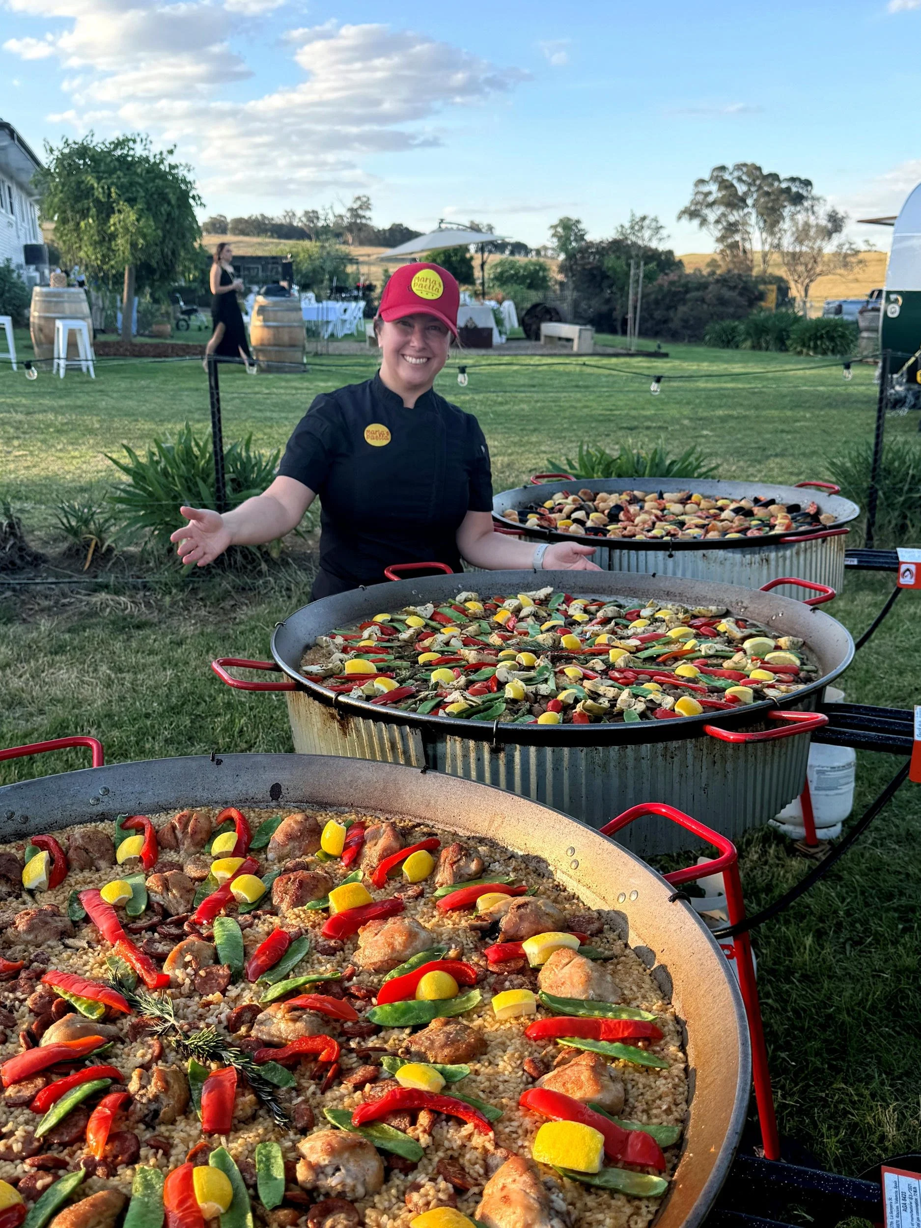 Maria Vicencio Munchmeyer catering paella at outdoor event