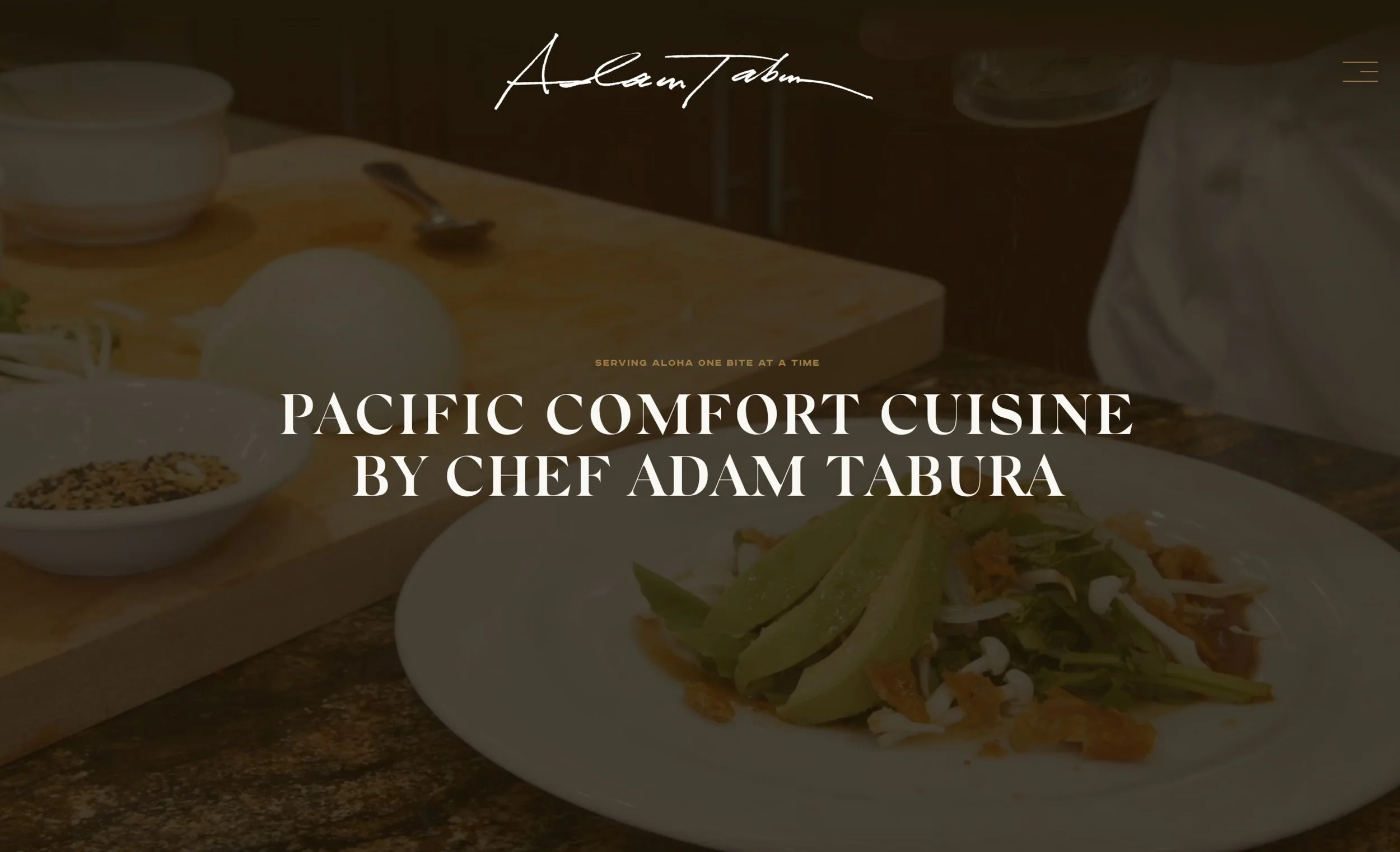 Website homepage for Pacific Comfort Cuisine by Chef Adam Tabura, featuring images of Asian-inspired dishes such as sliced avocado, fresh vegetables, and sauces on plates, with a dark background and modern font.