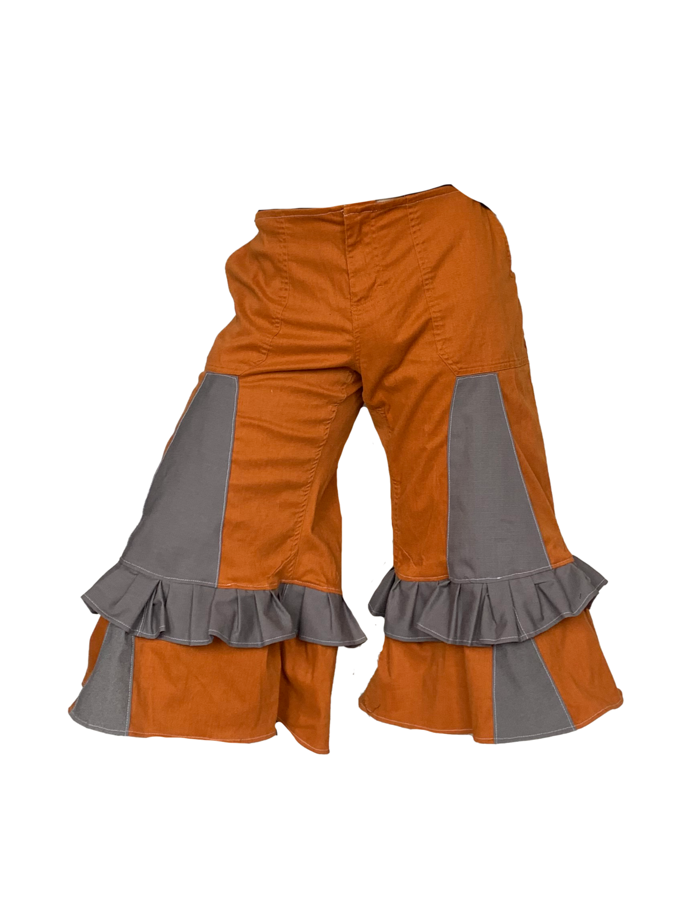 Orange shorts with fabric paneling, an upcycled design by Viking alterationist Jake Wright