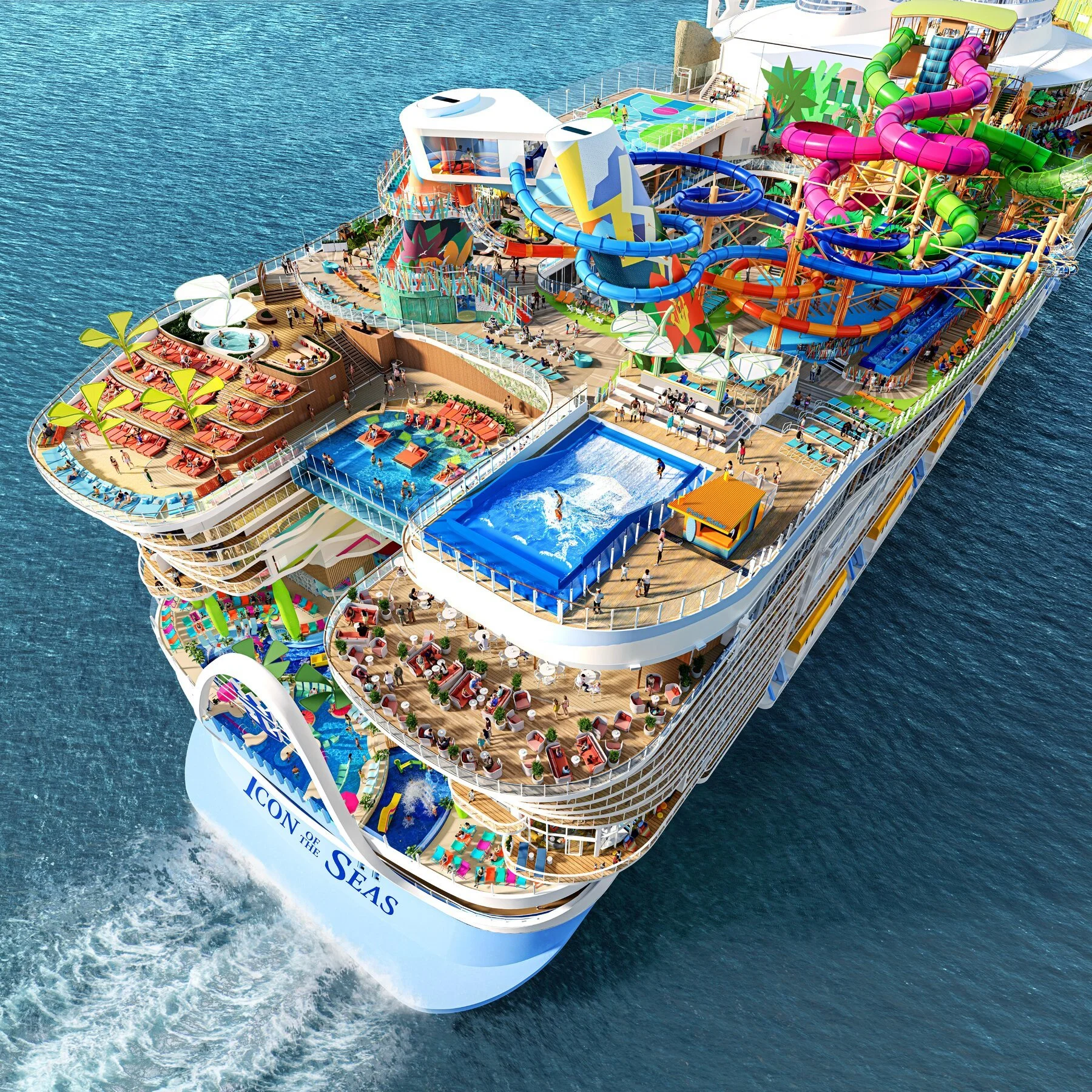 Aerial view of a large cruise ship with multiple decks, water slides, pools, and recreational areas situated in the ocean.