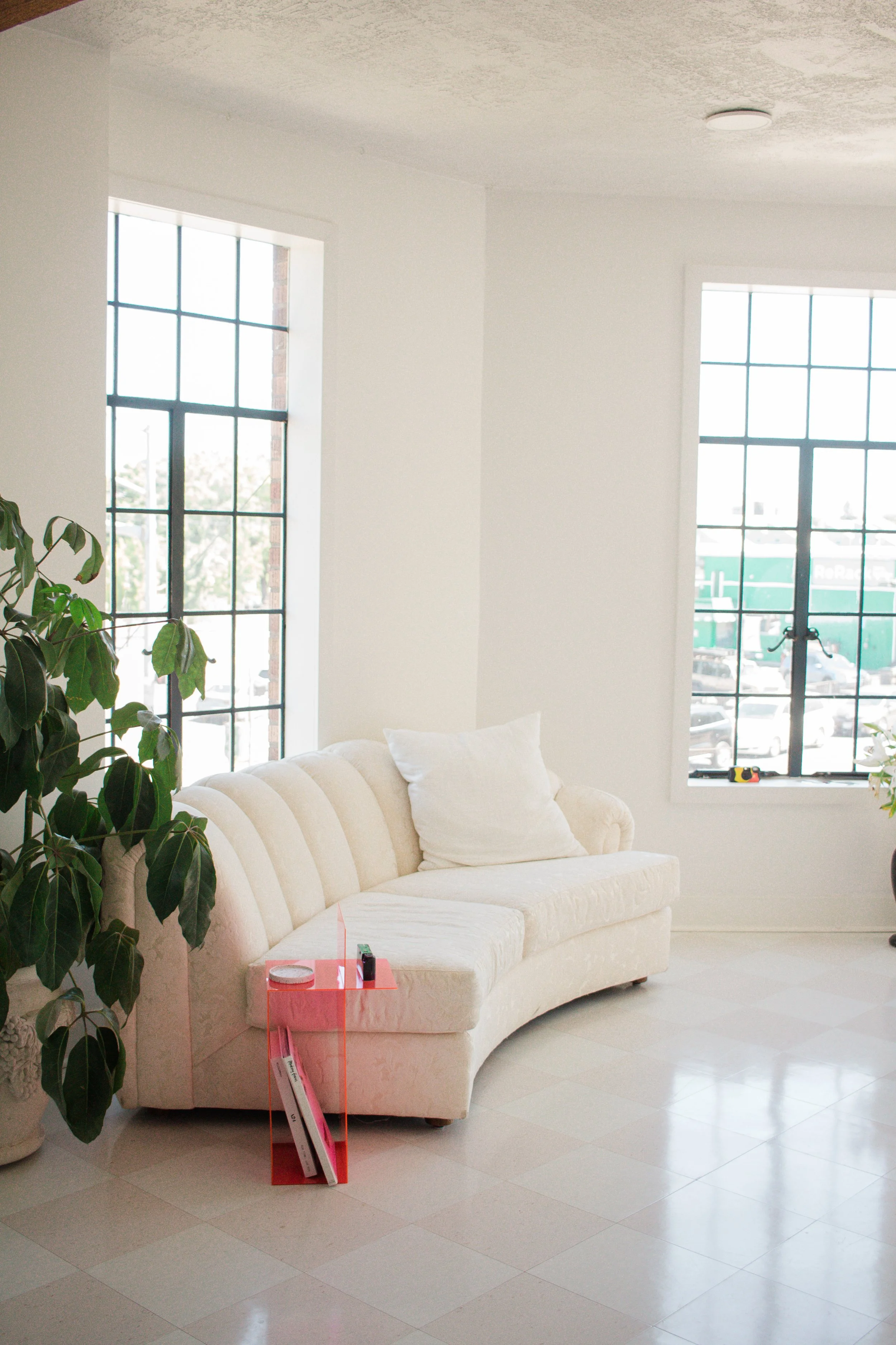 A white couch in the central salon at Hedon HQ in Portland, Oregon