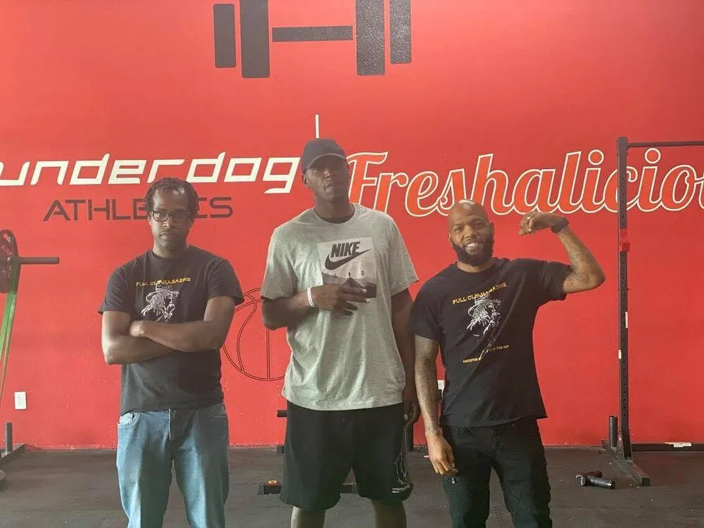 3 men standing in a gym named Underdog Athletics