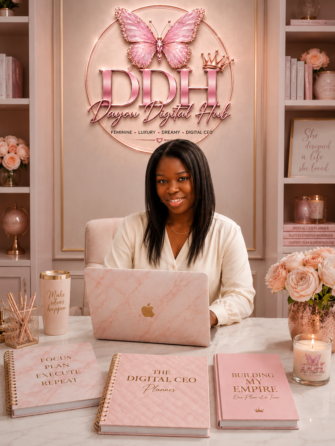 Darlyne working at a laptop in a pink Dayou Digital Hub office.