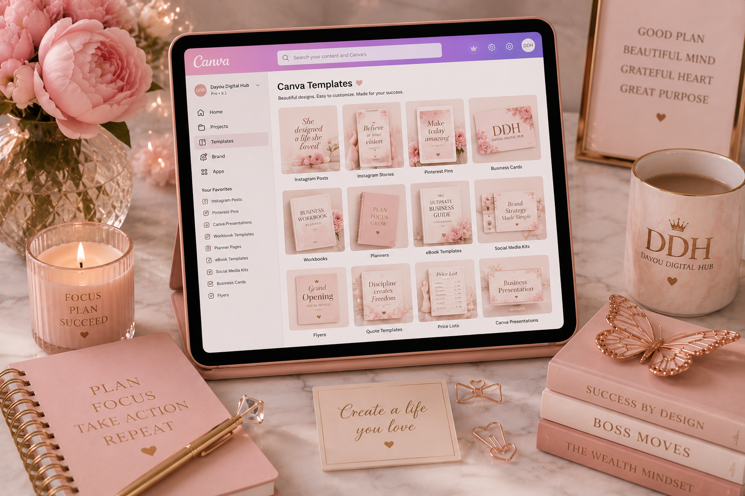 Tablet showing Canva templates on a pink marble workspace with notebooks, coffee, candles, and office supplies.