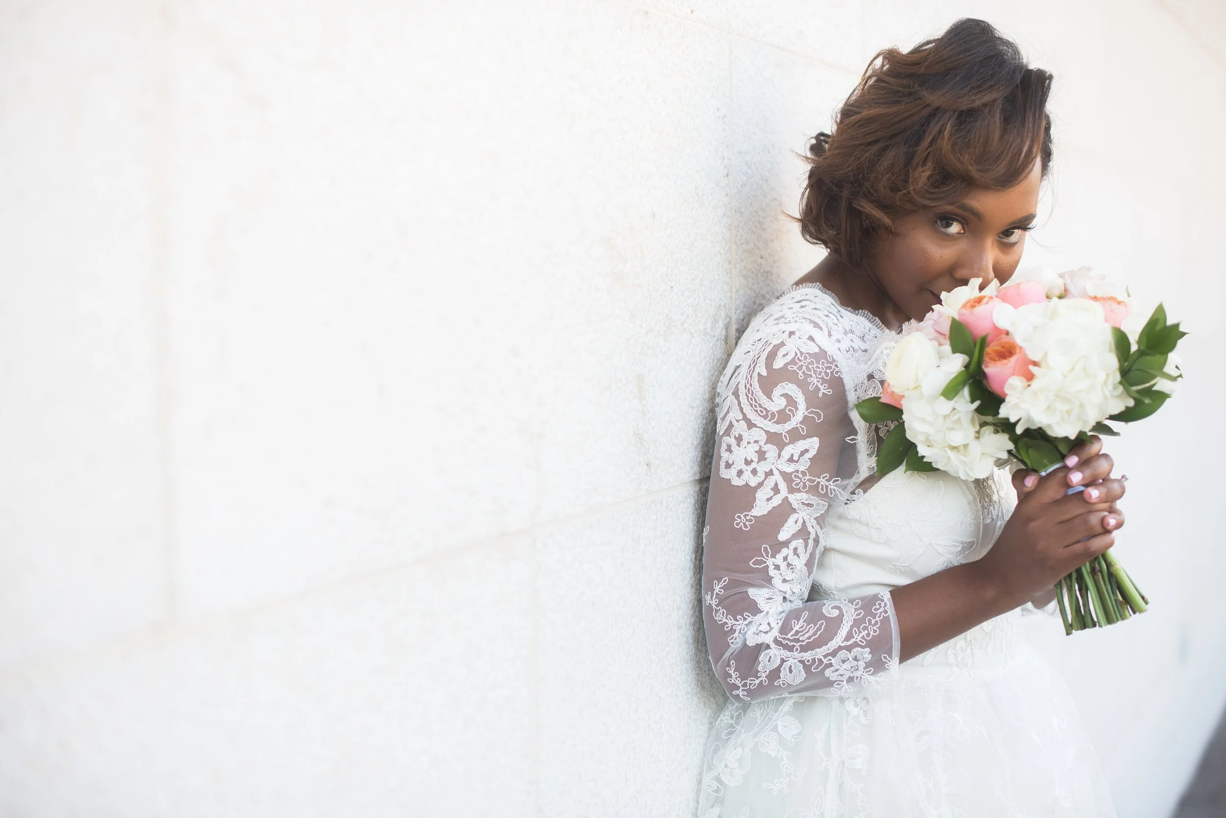 Bride holding flowers
