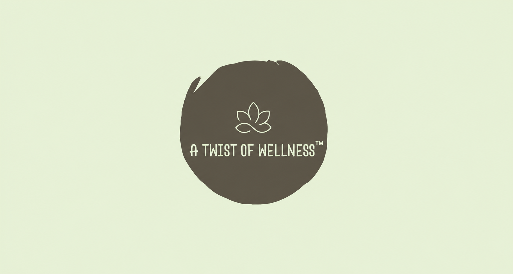 Logo with a leaf outline and the text 'A TWIST OF WELLNESS' inside a black circle on a light background.