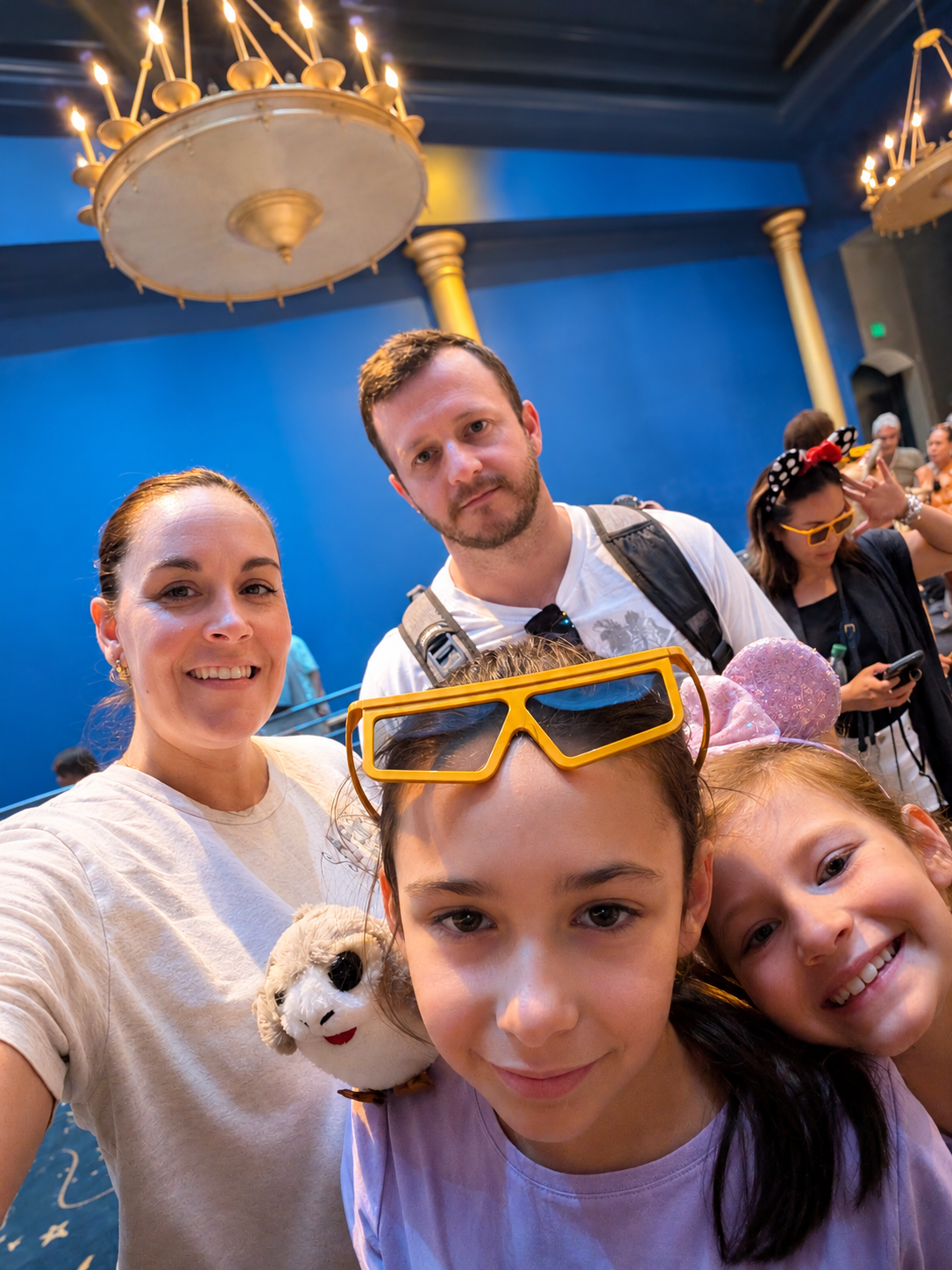 family wating for show at disney