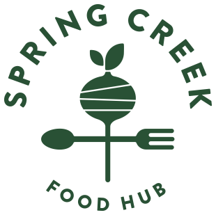 Logo for Spring Creek Food Hub featuring a stylized vegetable with a plant sprout on top, encircled by the text 'Spring Creek Food Hub'.