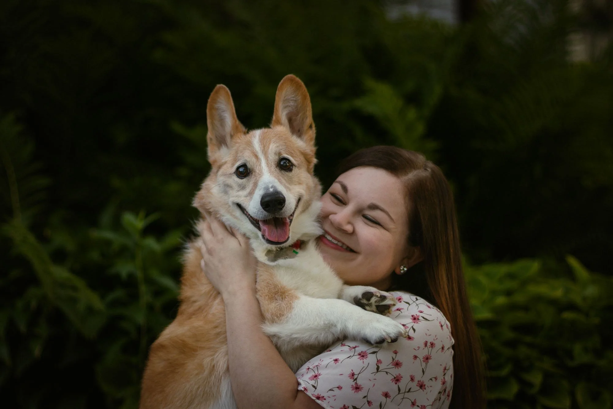 pet-photography-family-session-holding-corgi-laughing-oklahoma-city-001.jpg