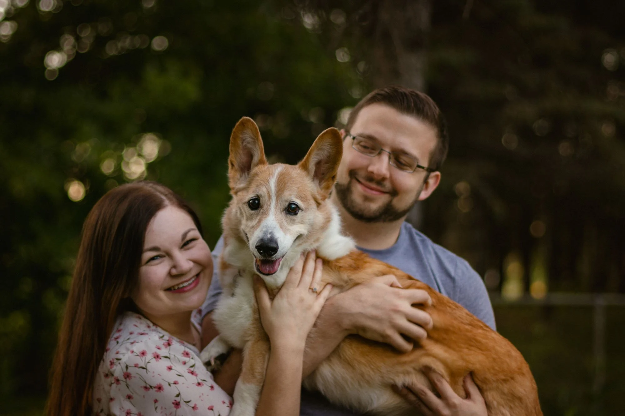pet-photography-family-portrait-outdoor-session-holding-corgi-oklahoma-city-001.jpg