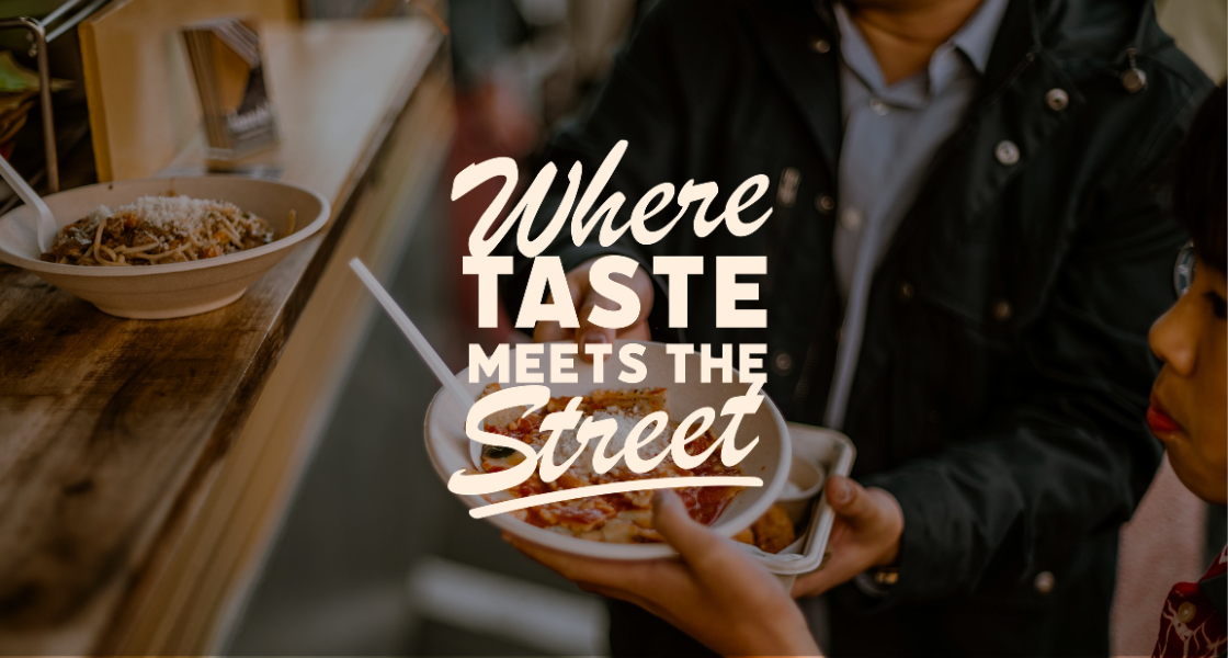 People holding a plate of food at a street food stand with a bowl of pasta on the counter, and the text 'Where Taste Meets the Street' overlayed.