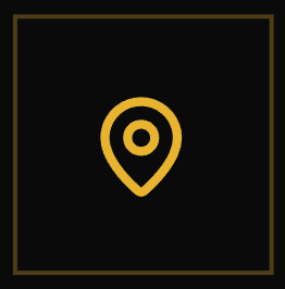 A gold map pin icon on a black background with a gold border.
