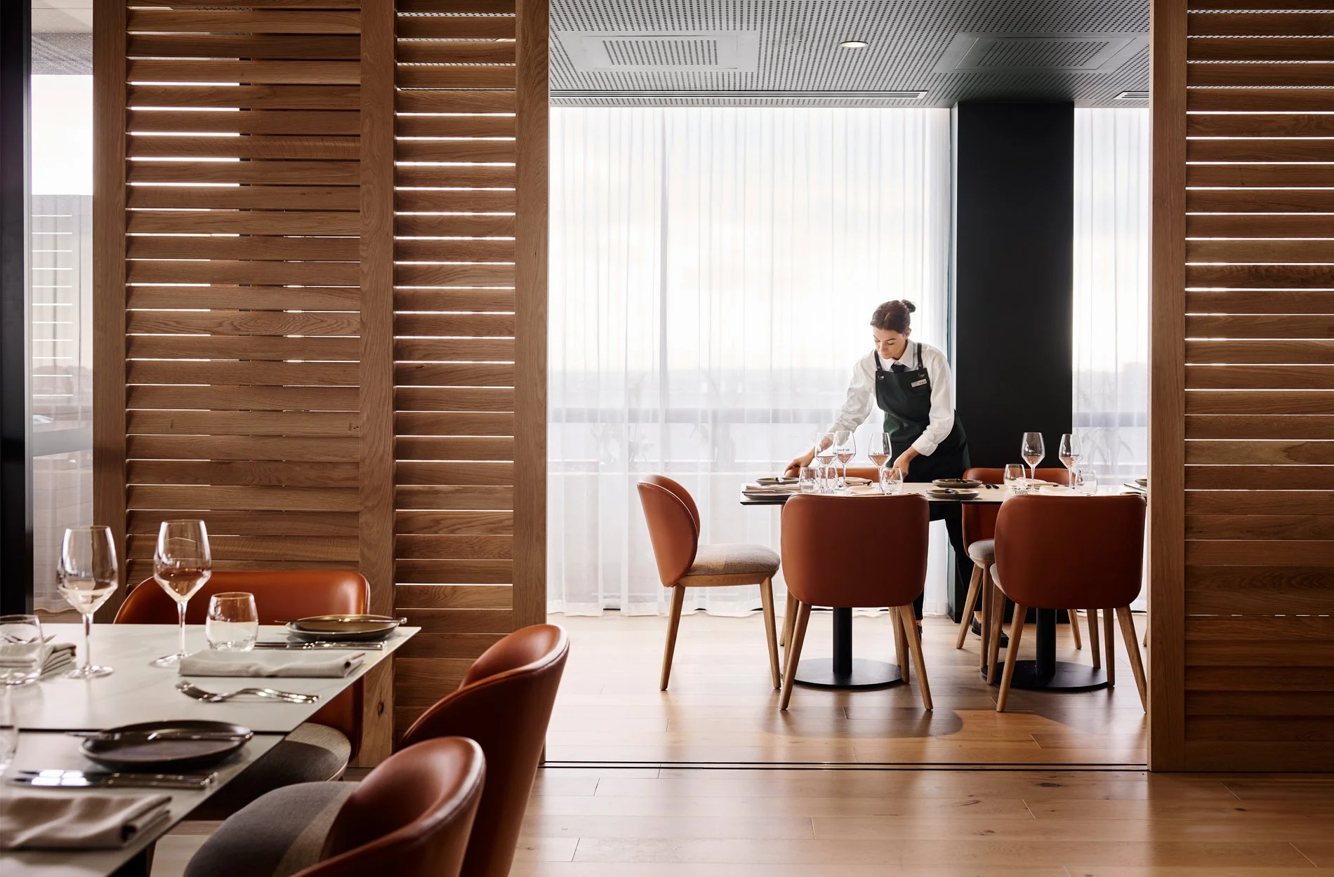 Restaurant prepared for service, illustrating Hospitality & More's philosophy that people, leadership and hospitality thinking create exceptional customer experiences.
