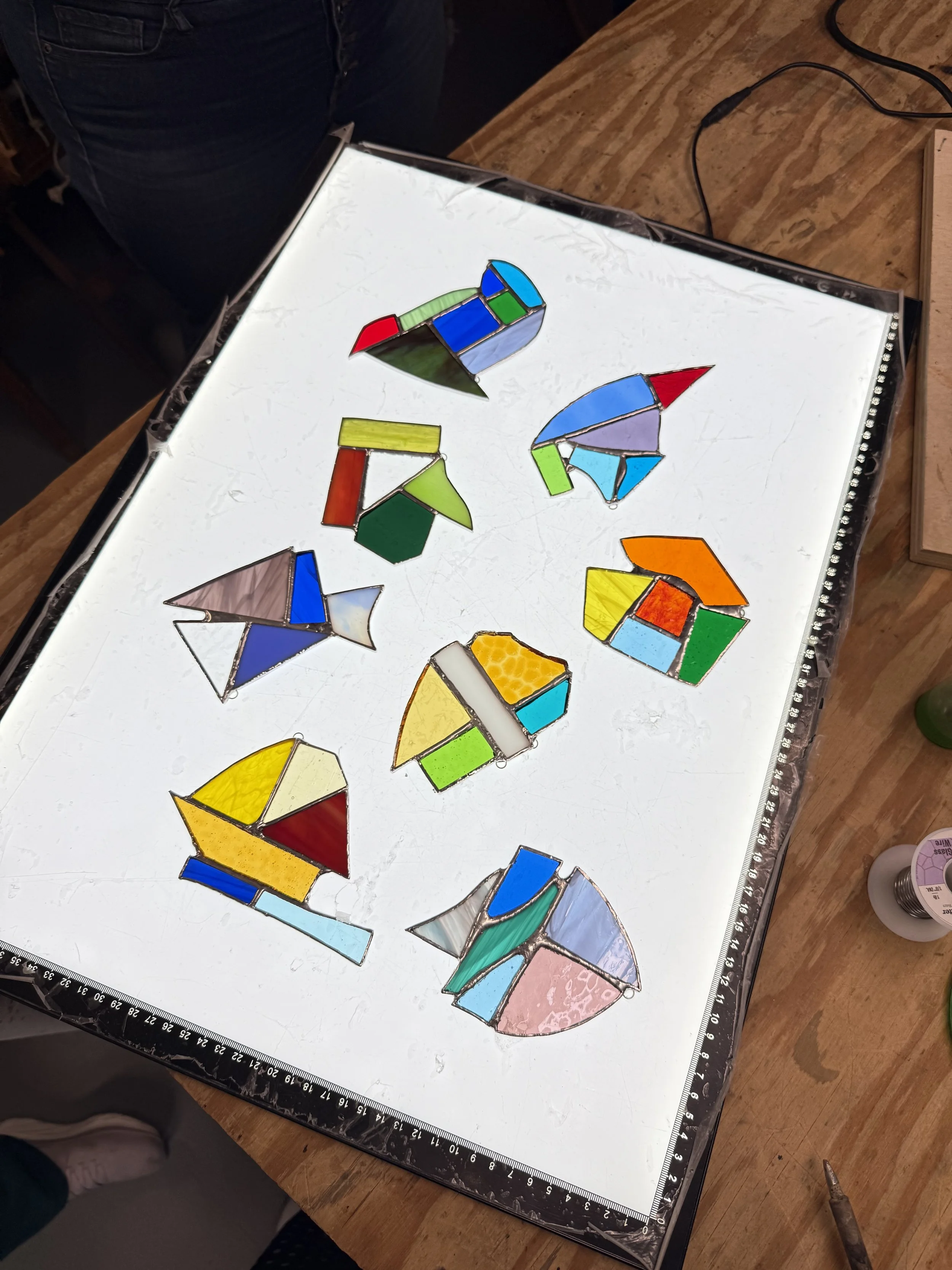 Student pieces made in a 2 hour beginner "try it" workshop using precut scrap