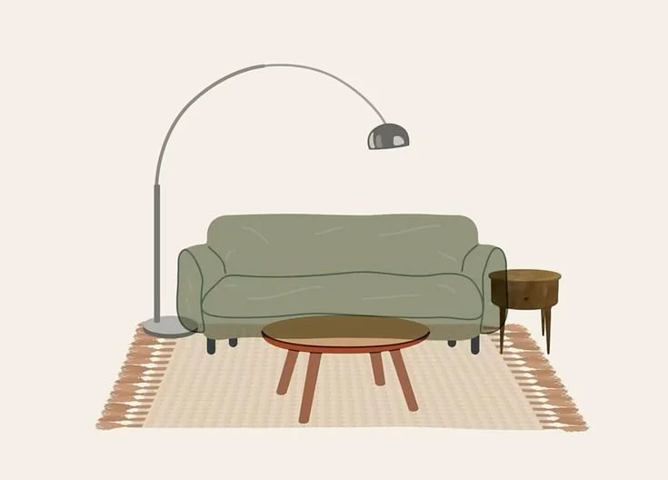 Living room with green sofa, wooden side table, round coffee table, beige rug, and a tall floor lamp.