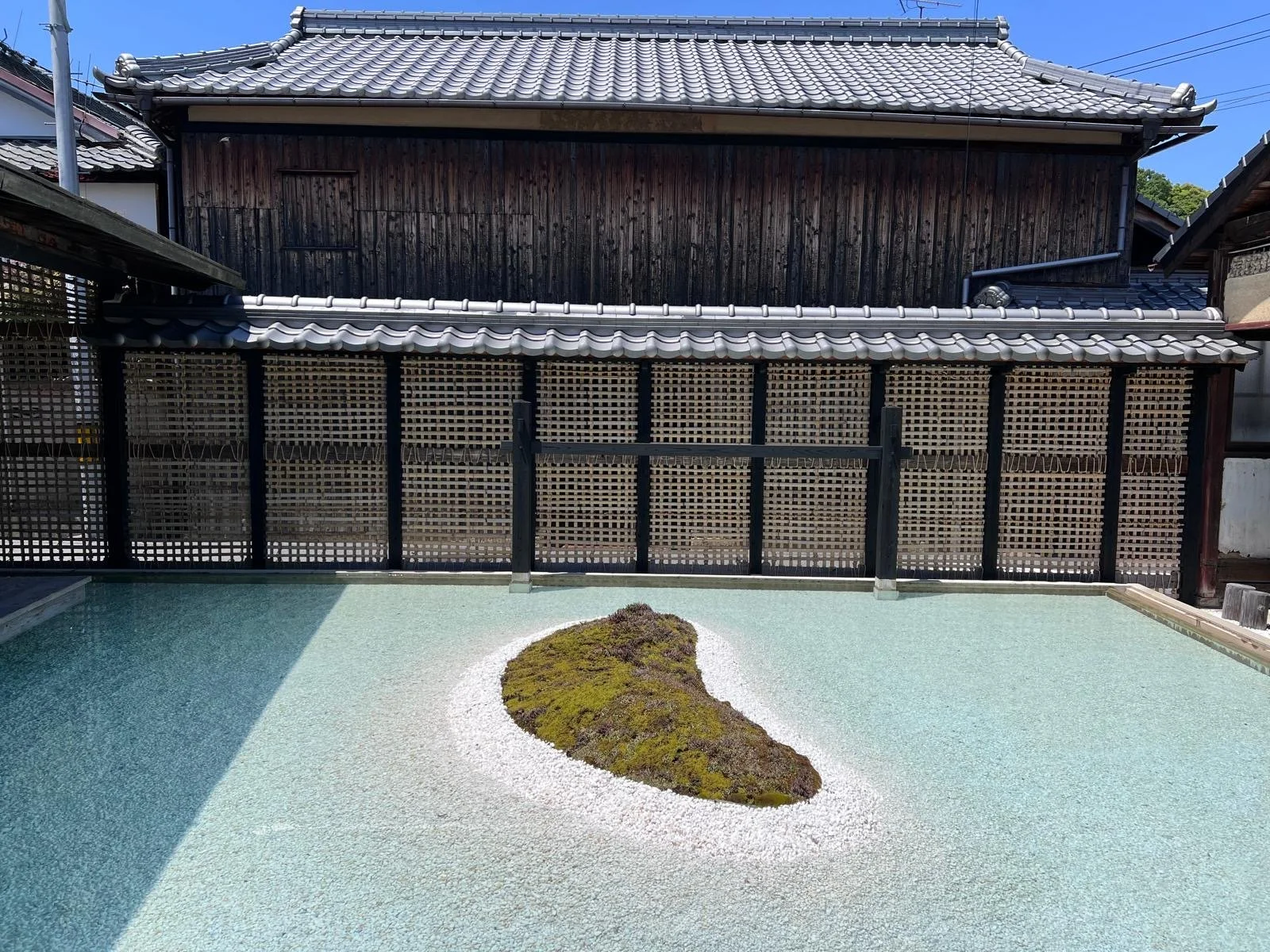 Travellers exploring Japanese gardens and art installations during a cultural tour with Japan Art Tours.