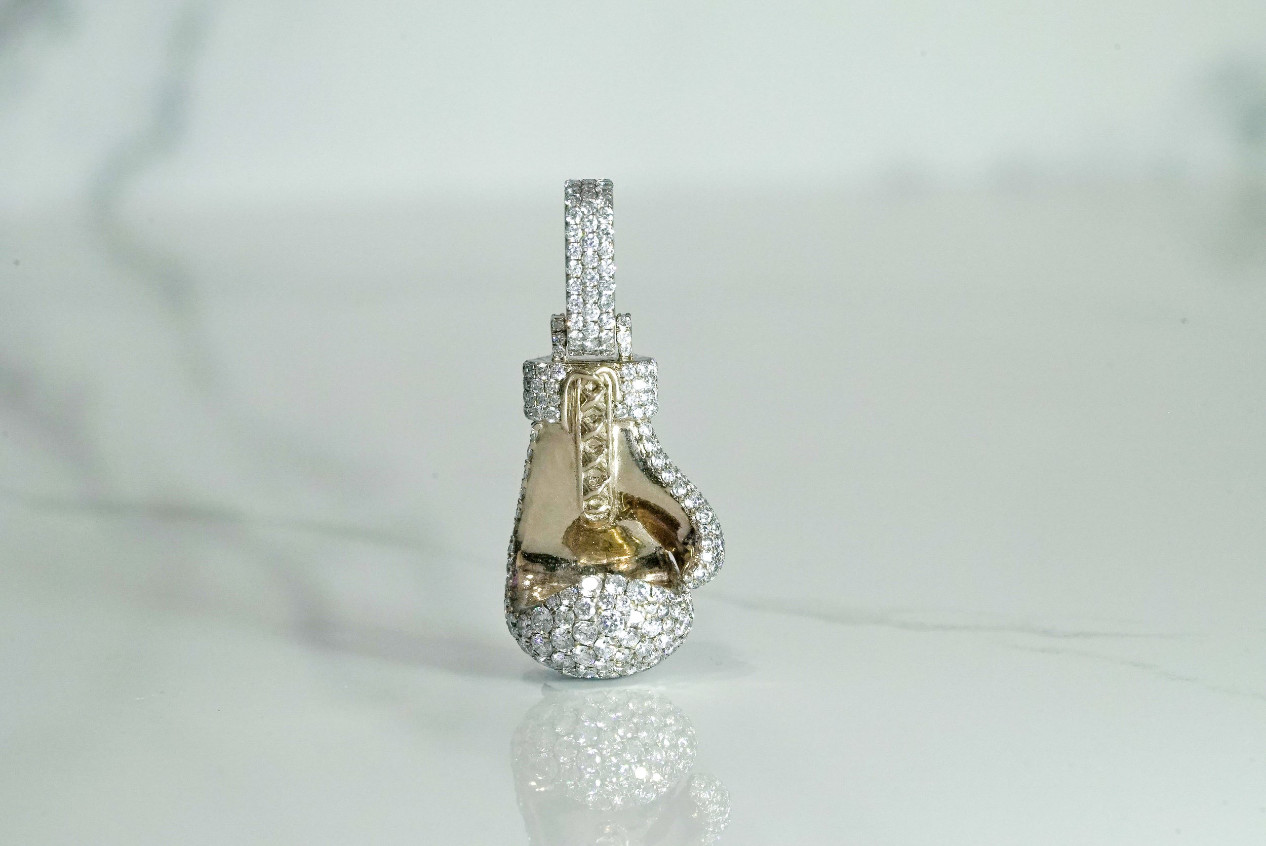 The Champion boxing glove pendant set with 5.93ct of VS1 lab-grown diamonds, side view