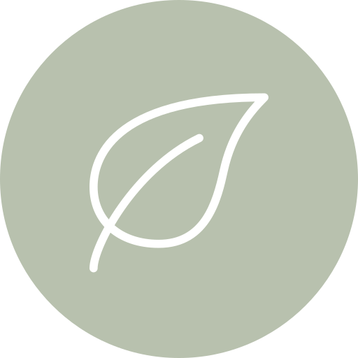 A white outline of a leaf on a muted green circular background.