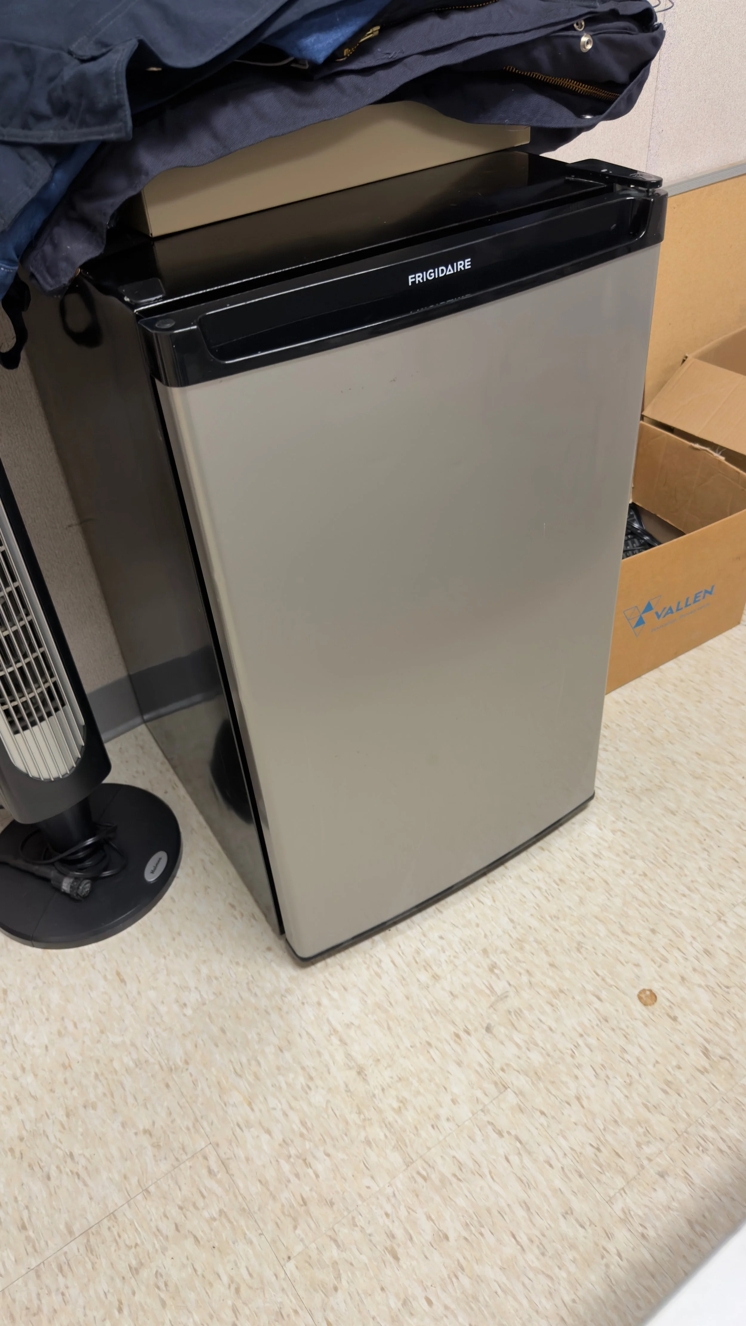 A beautifully polished, smudge-free, and sanitized stainless steel office refrigerator exterior after detailed commercial cleaning by TerraPro.⁠