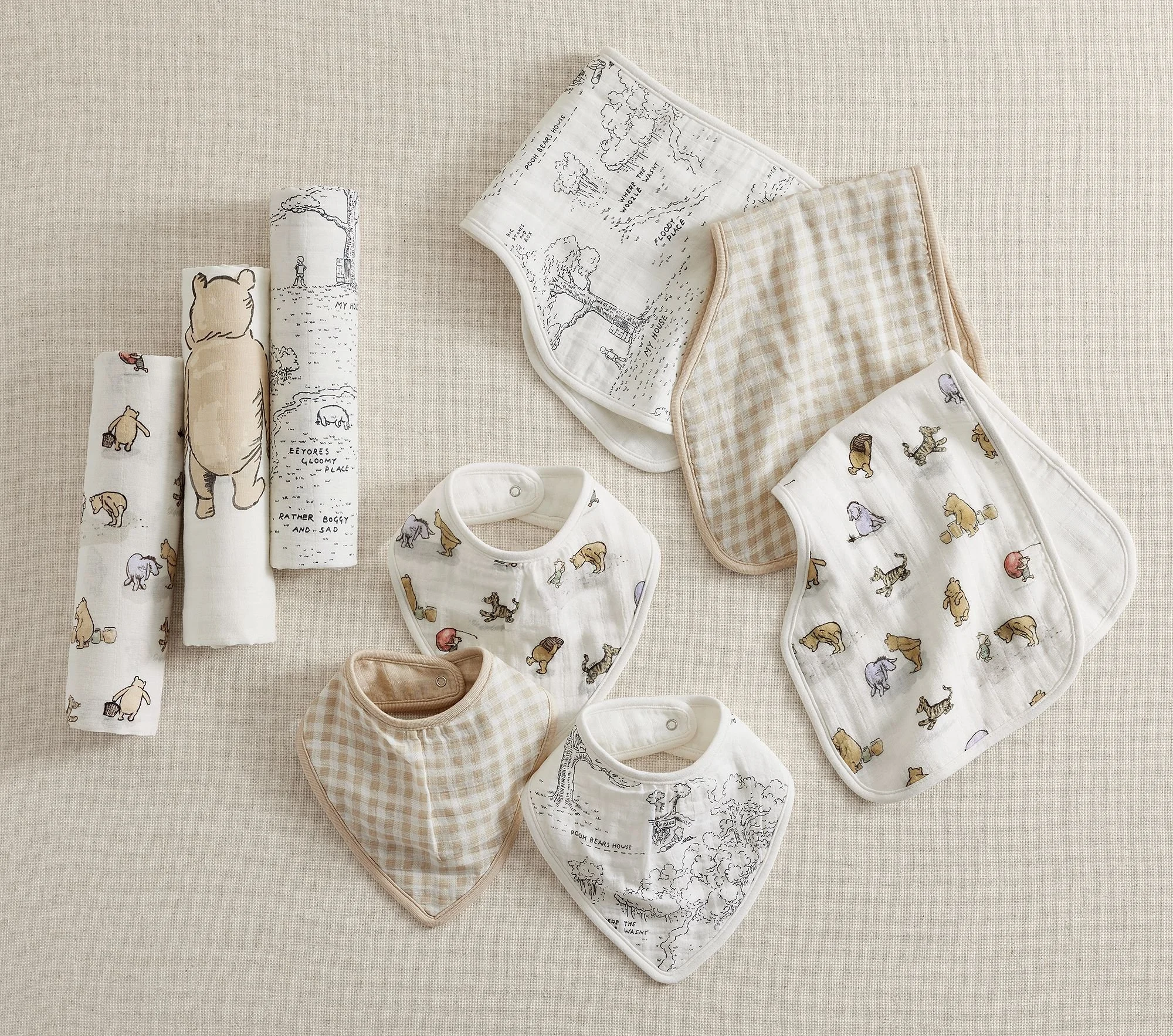 disneys-winnie-the-pooh-organic-muslin-bib-burp-and-swaddl-xl.jpg