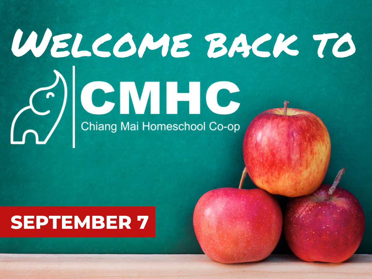 A green background sign with white text reading "Welcome Back to CMHC Chiang Mai Homeschool Co-op" and a graphic of an elephant. The sign also displays the date "September 7" in a red box. In front of the sign, three red apples are stacked on a wooden surface.