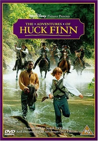 Cover of the DVD of The Adventures of Huck Finn featuring Huck and Jim walking through a river with horses and riders in the background.