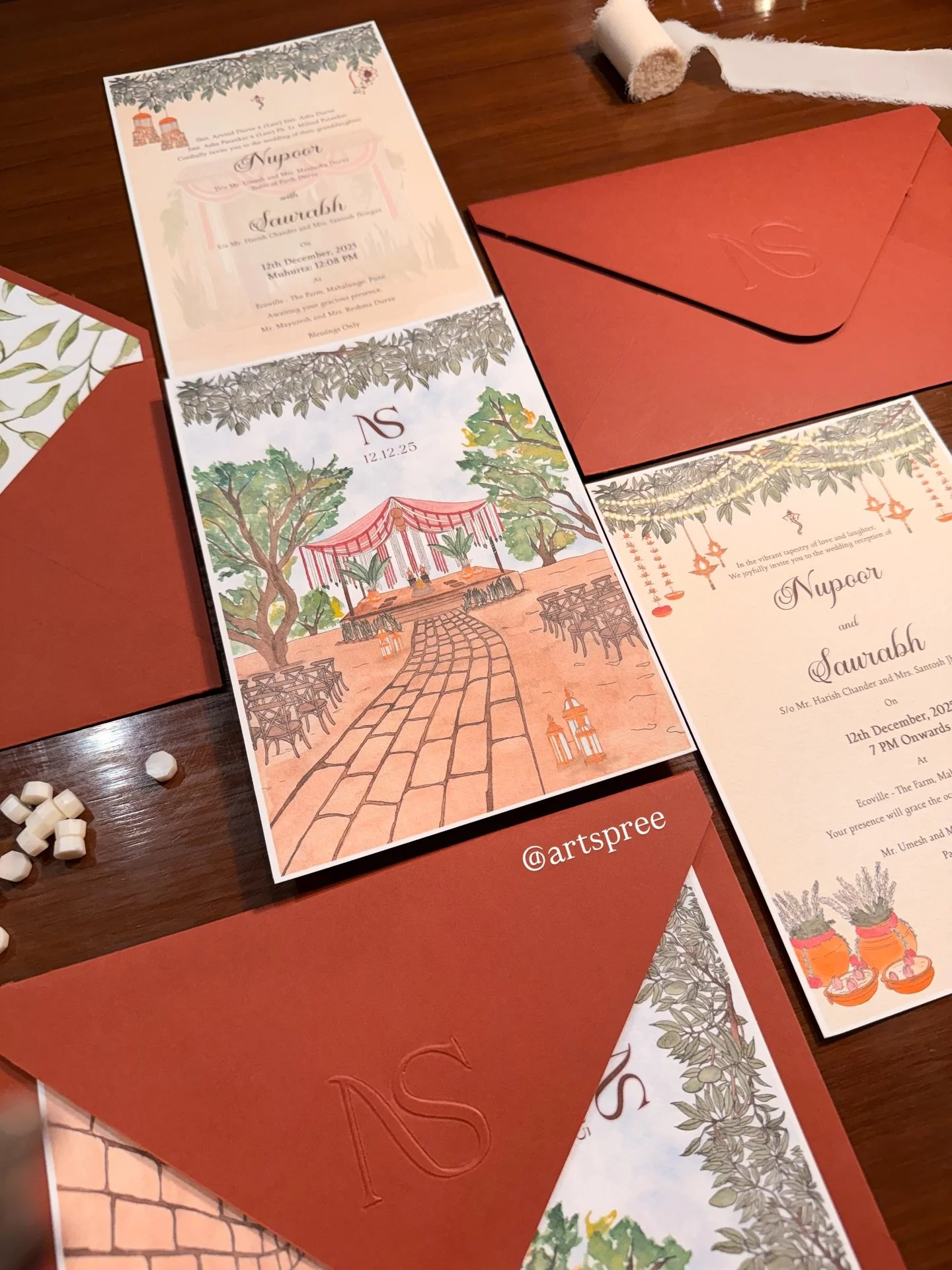 Terracotta tones, leafy greens, and a touch of gold ✨
Loved creating this warm and earthy wedding invitation suite that perfectly captures the charm of an outdoor mandap setup 🌿💍
Every detail &mdash; from the illustrated venue to the embossed initi